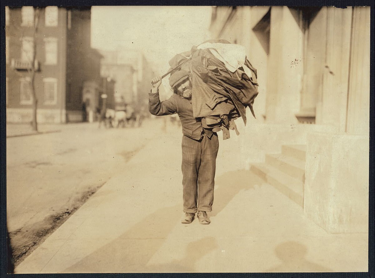 Man carrying a big burden