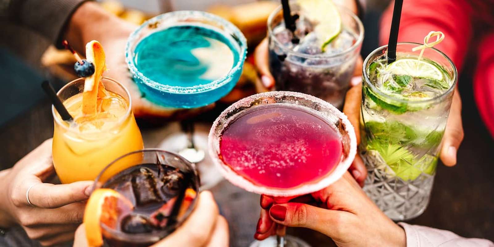 Students toasting a mixture of cocktails