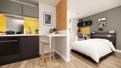 Modern studio apartment with a kitchen, dining area, and bedroom. Features wood flooring, yellow accents, and wall decorations.