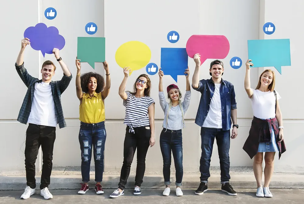 teens holding text boxes