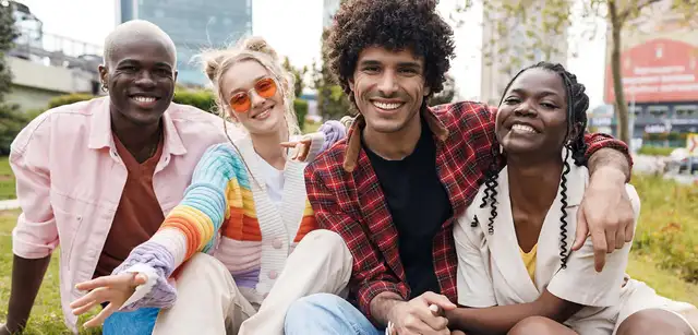 Group of students sitting in the park