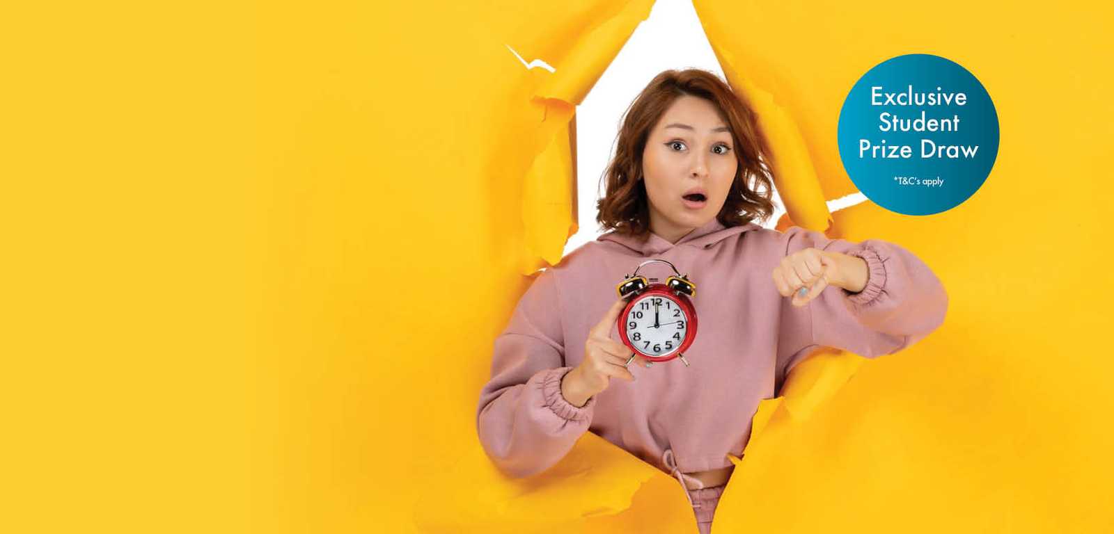 Surprised woman in pink holds a red alarm clock, pointing at it, emerging through torn yellow paper. Blue circle with "Exclusive Student Prize Draw."