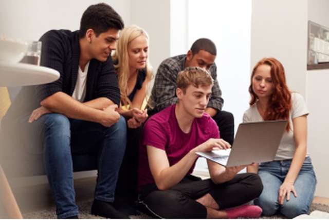 Group of students on a laptop