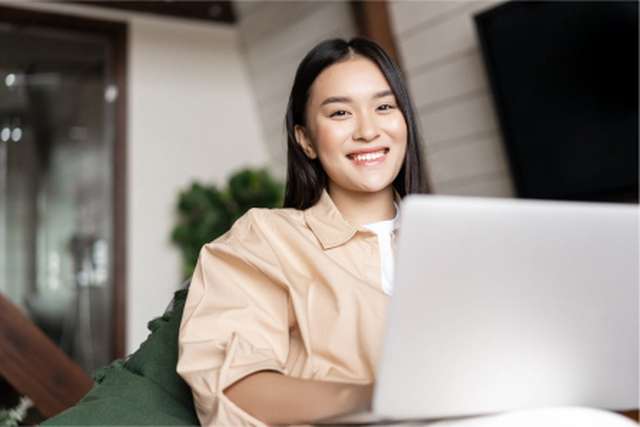 International student on a laptop