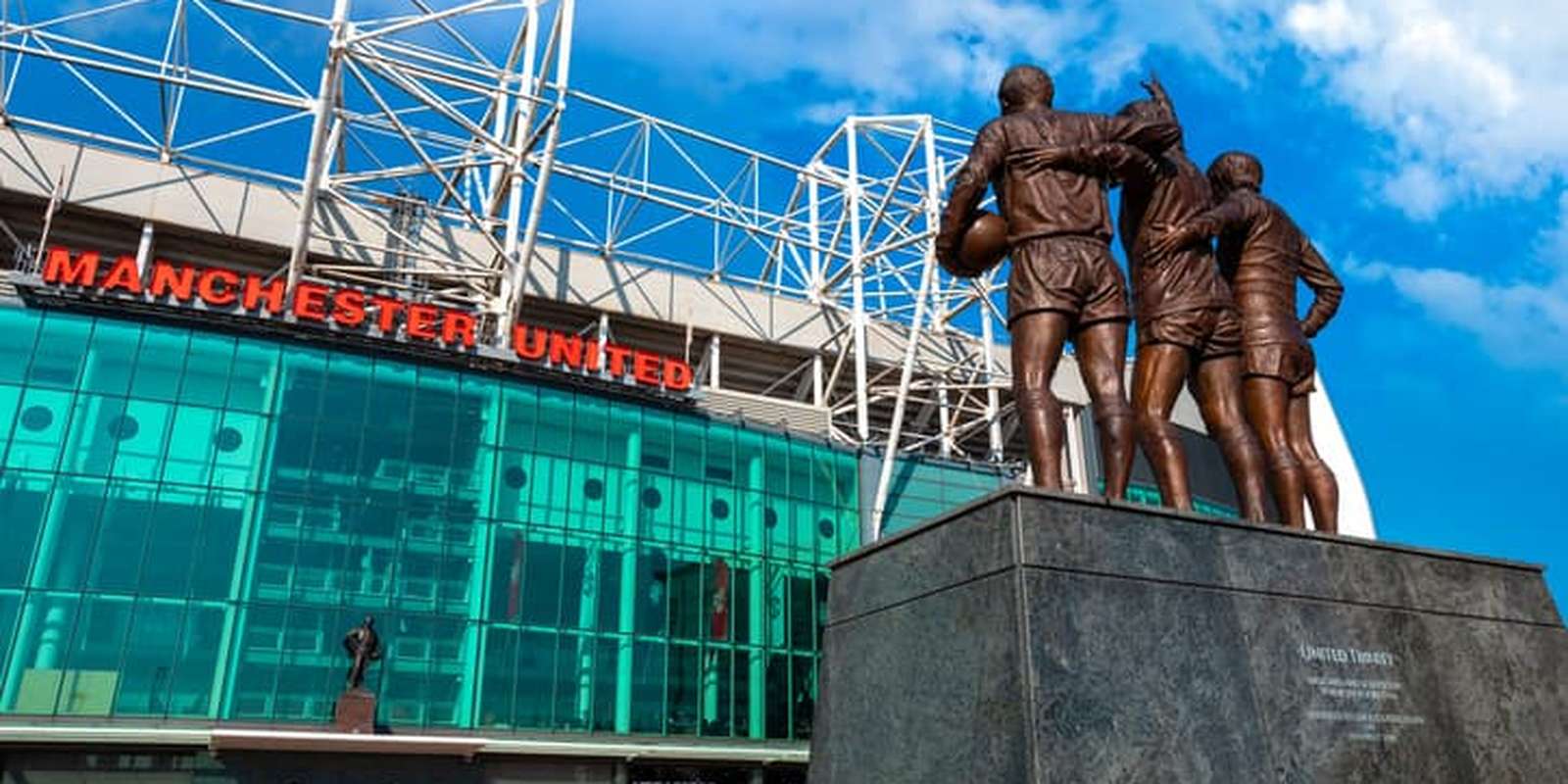 The United Trinity bronze sculpture at Old Trafford stadium in Manchester