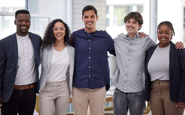 diverse group of businesspeople standing in the office