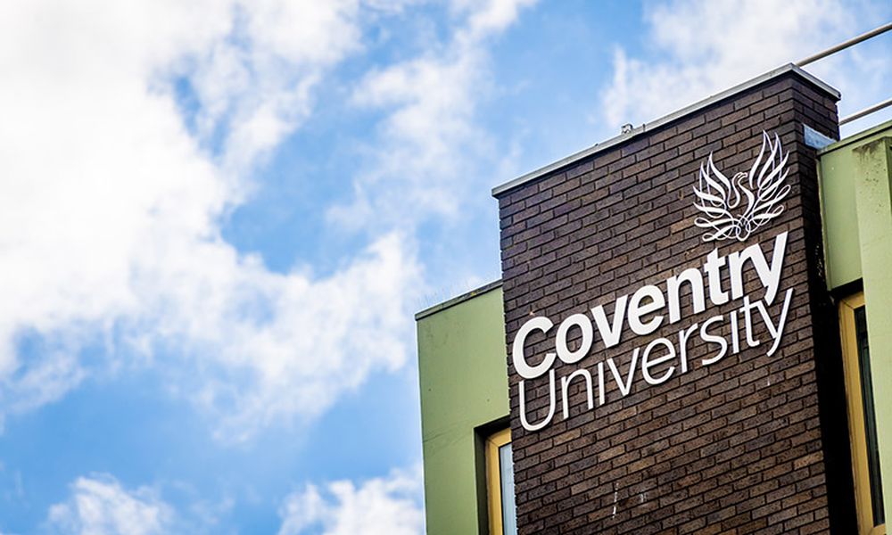Photo of Coventry university logo on the side of a building