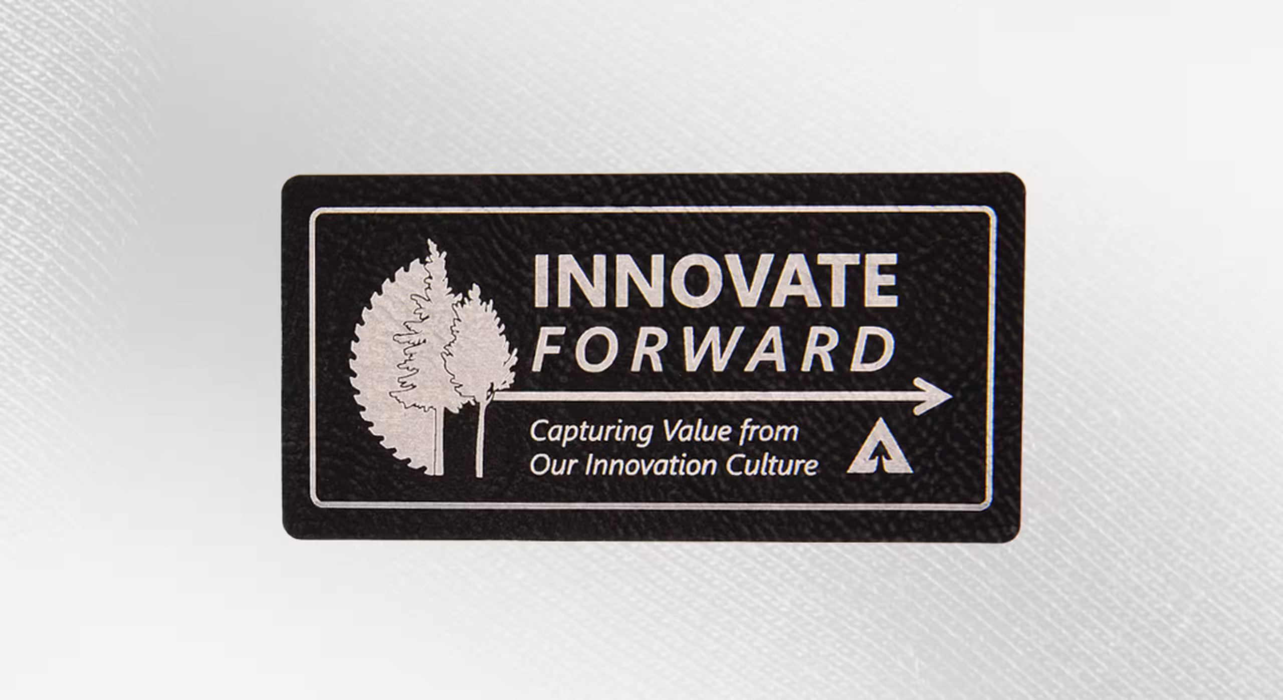 a black and silver faux leather rectangler patch