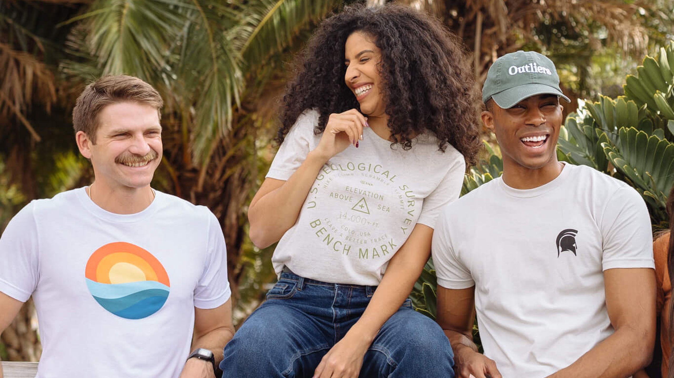 three people wearing white shirts