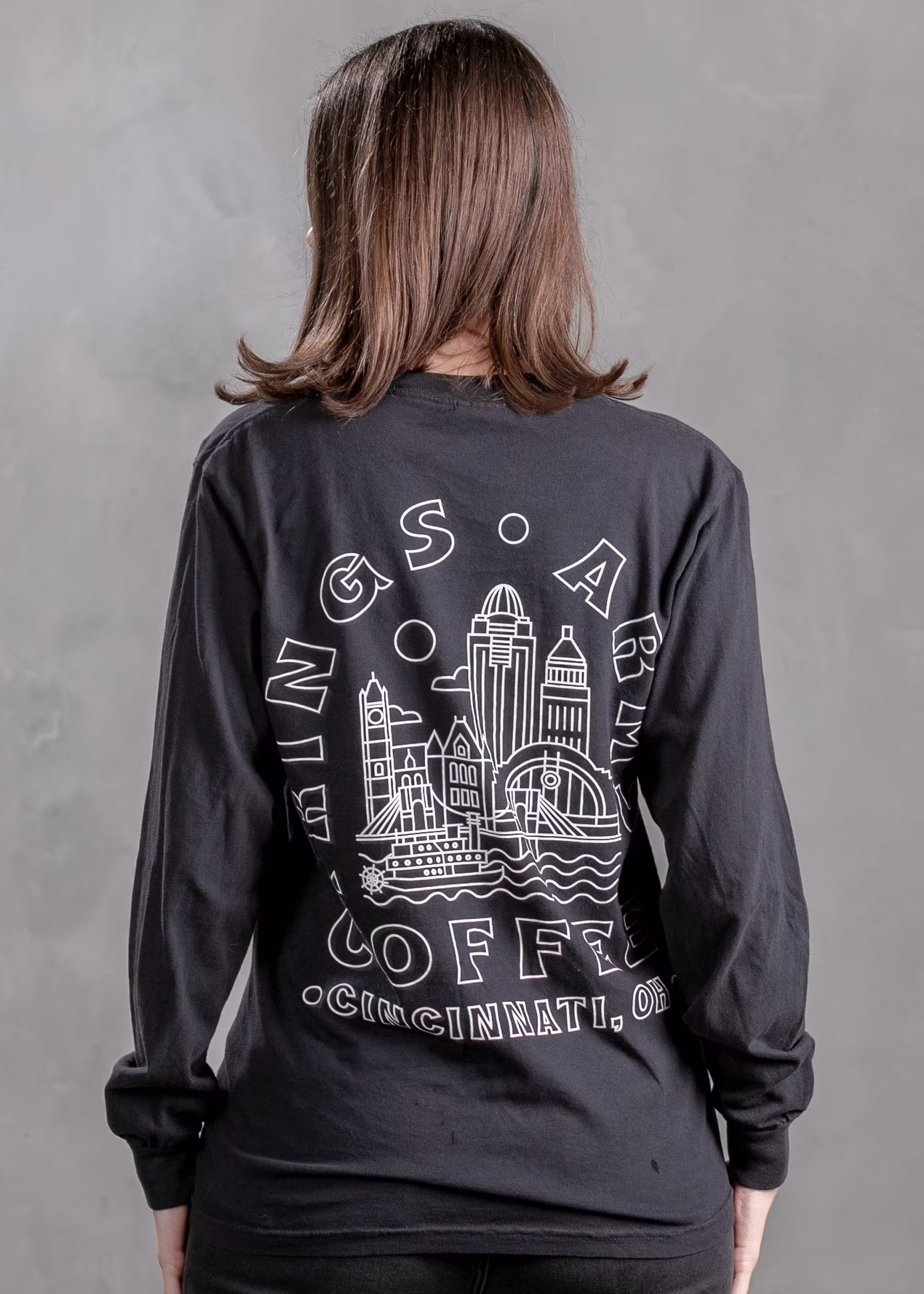 woman wearing a long sleeve black t-shirt