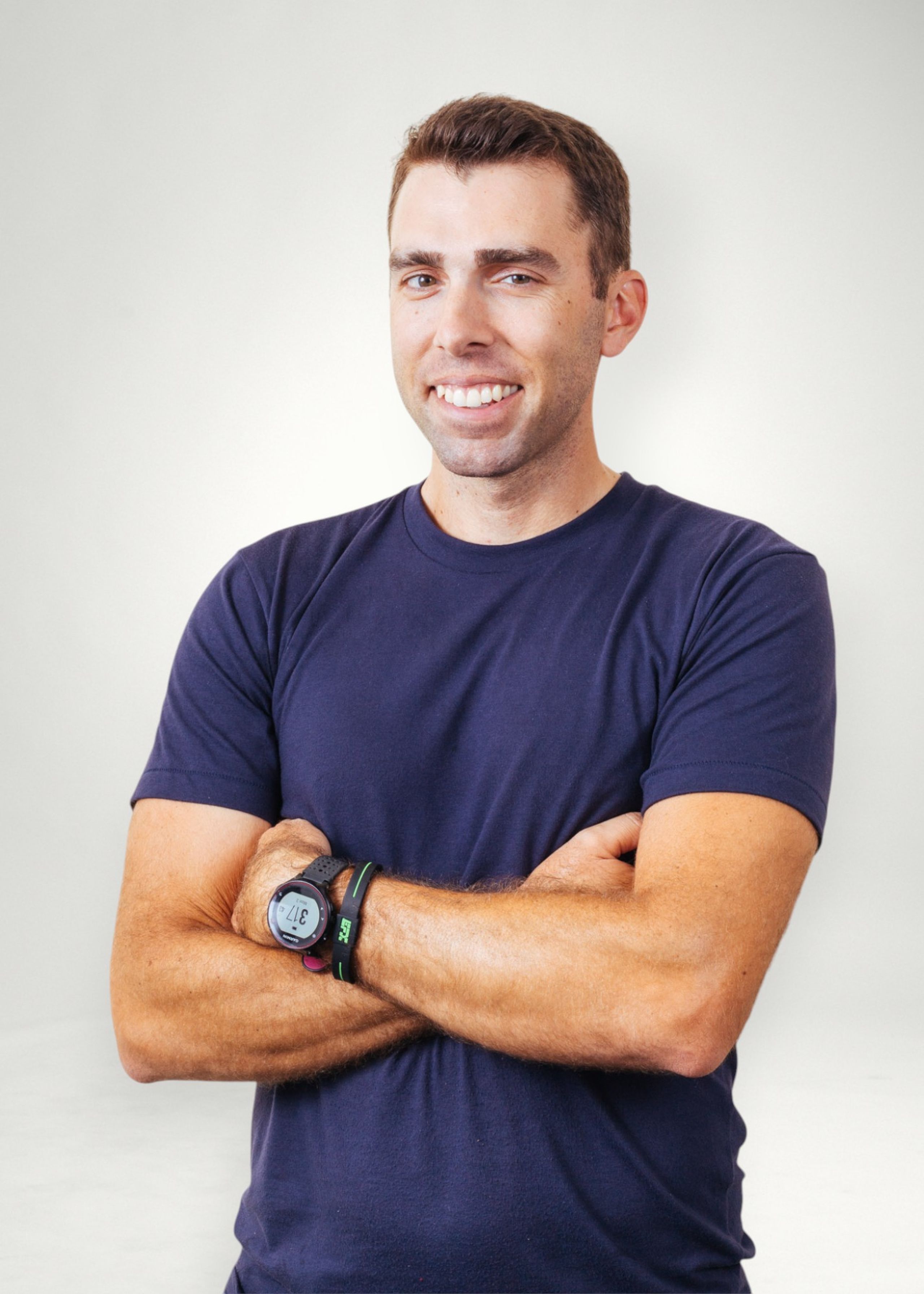 Matt poses in front of white background