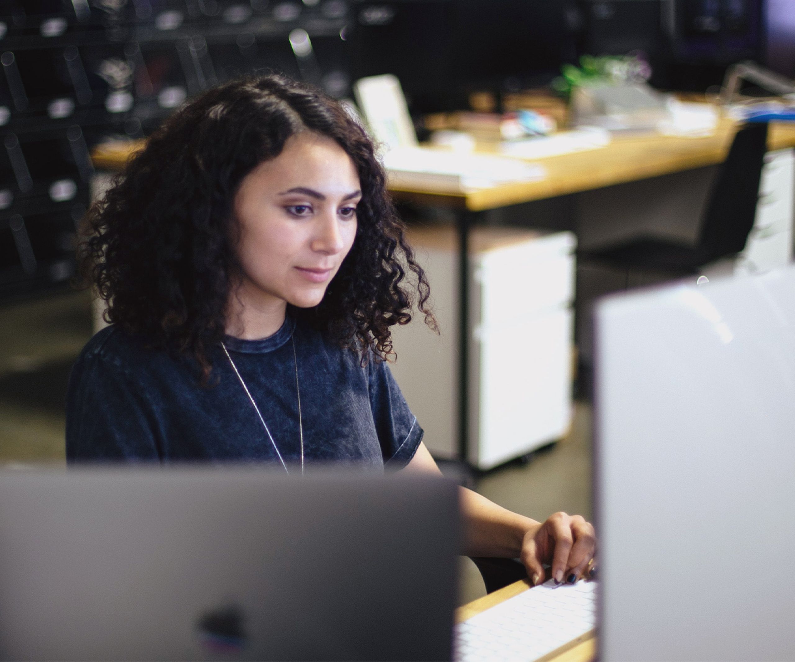 women sitting at a computer