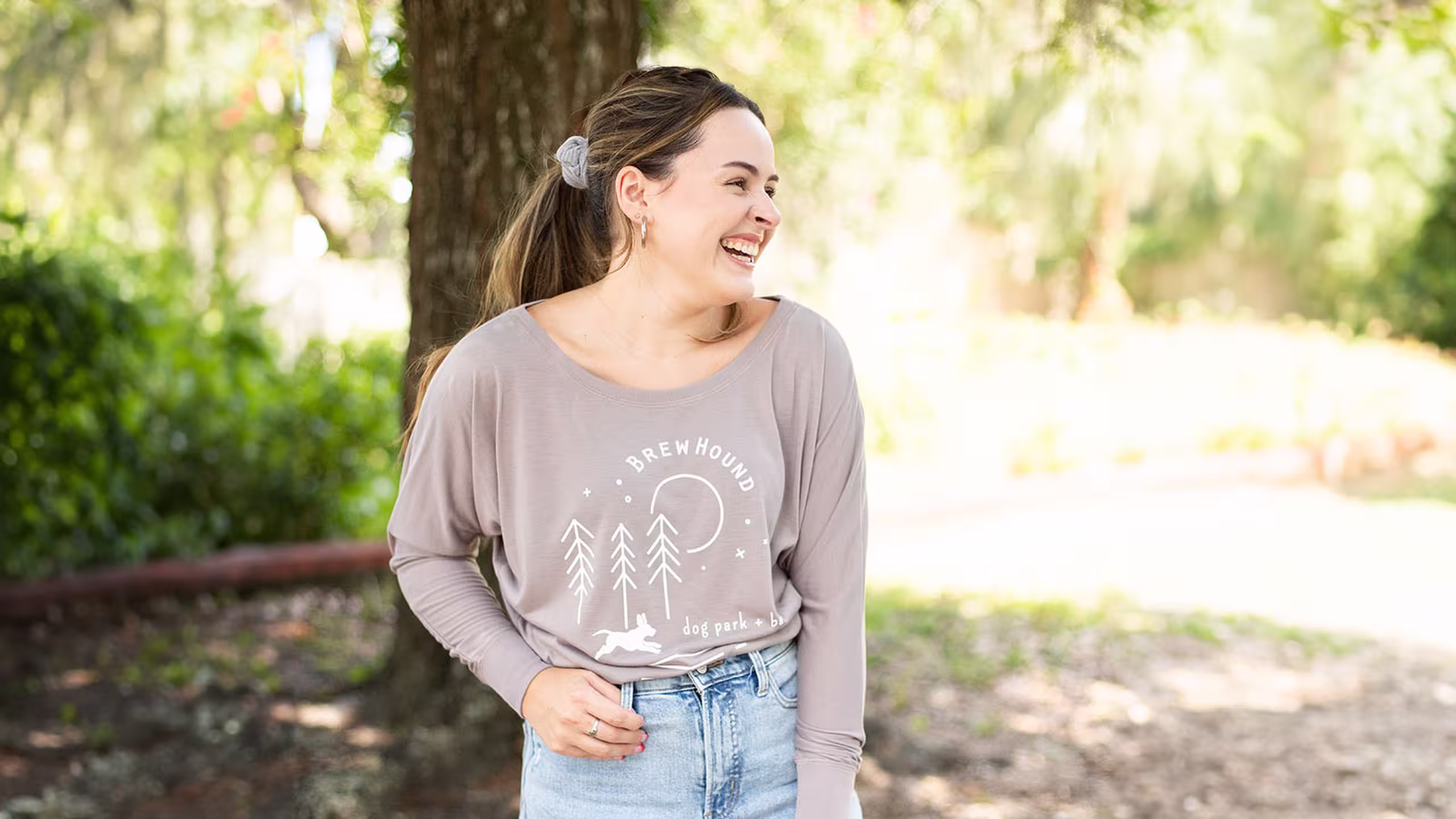 woman wearing a swoop-neck sweatshirt