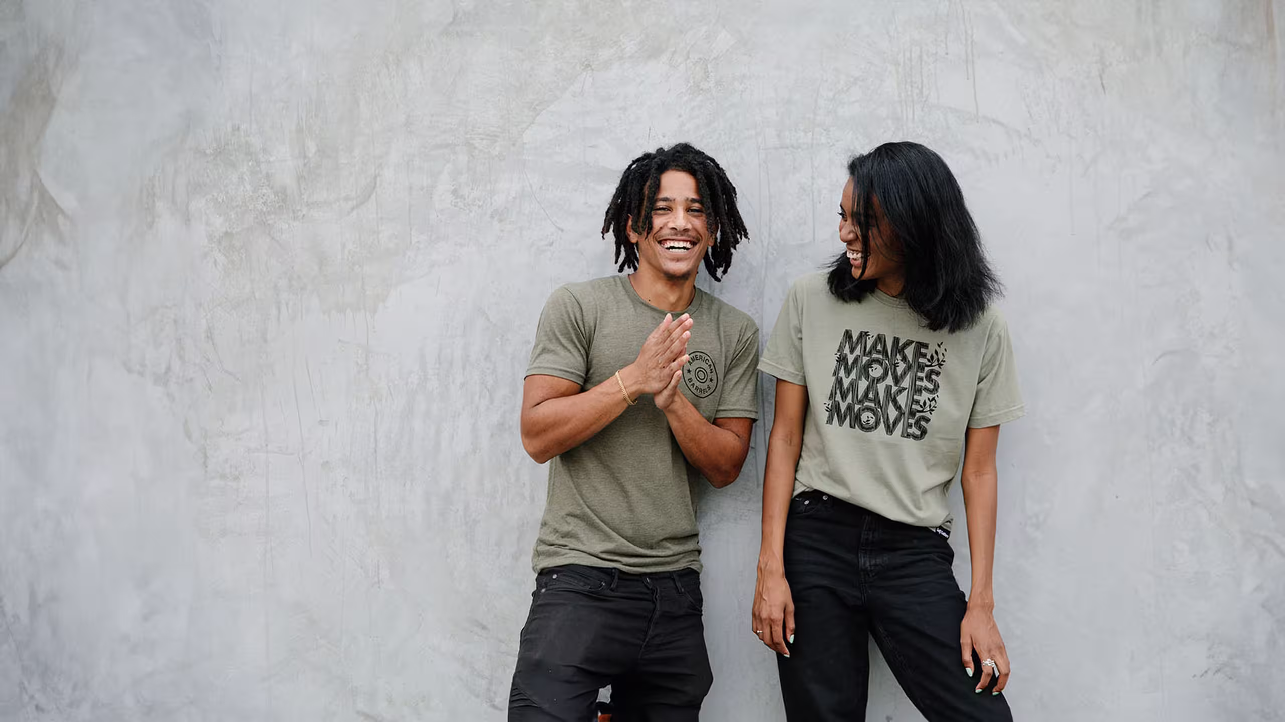 man and women wearing faded green shirts