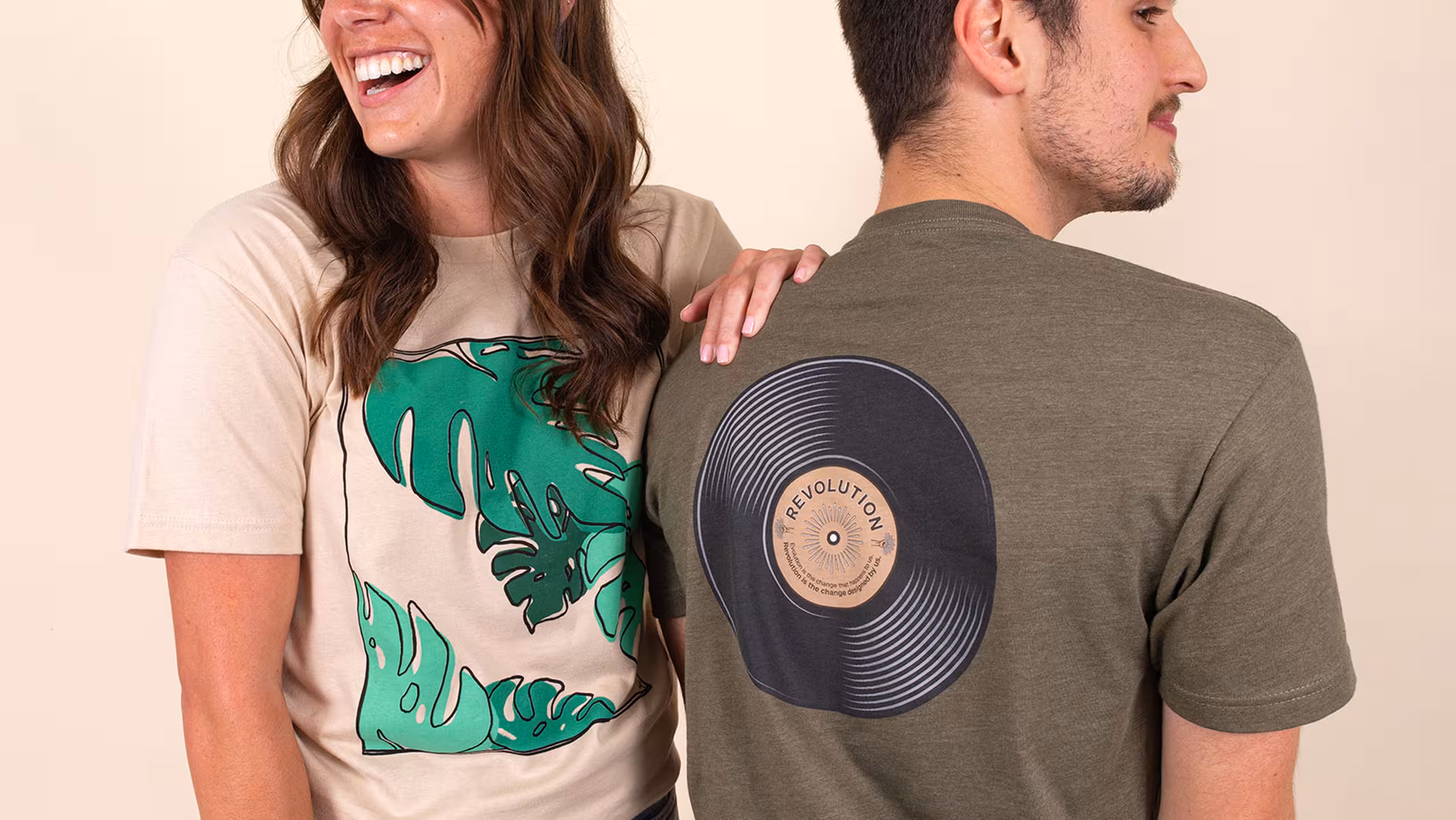 women wearing a tan t-shirt and a man wearing a olive tee