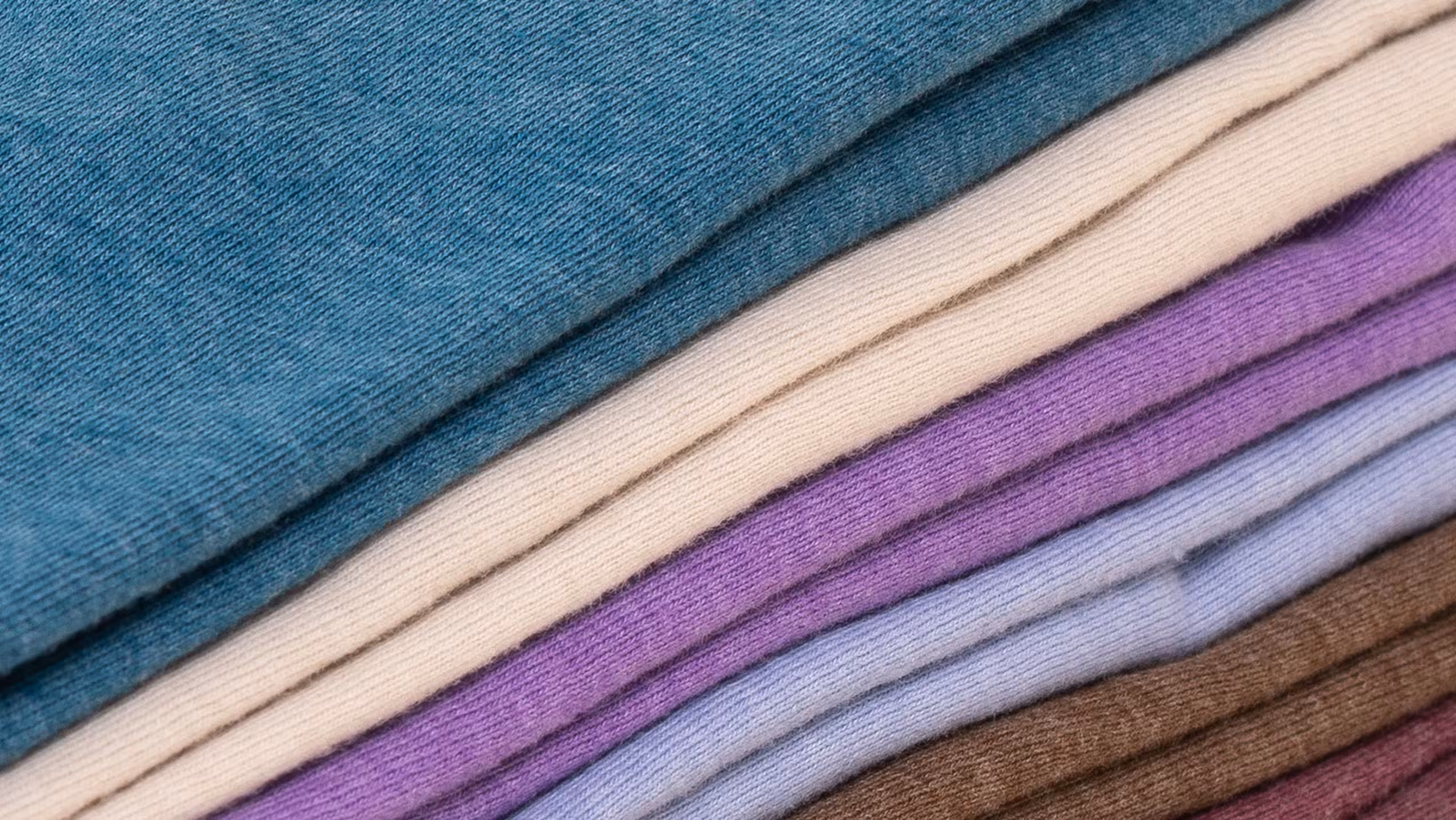 close up stack of t-shirts