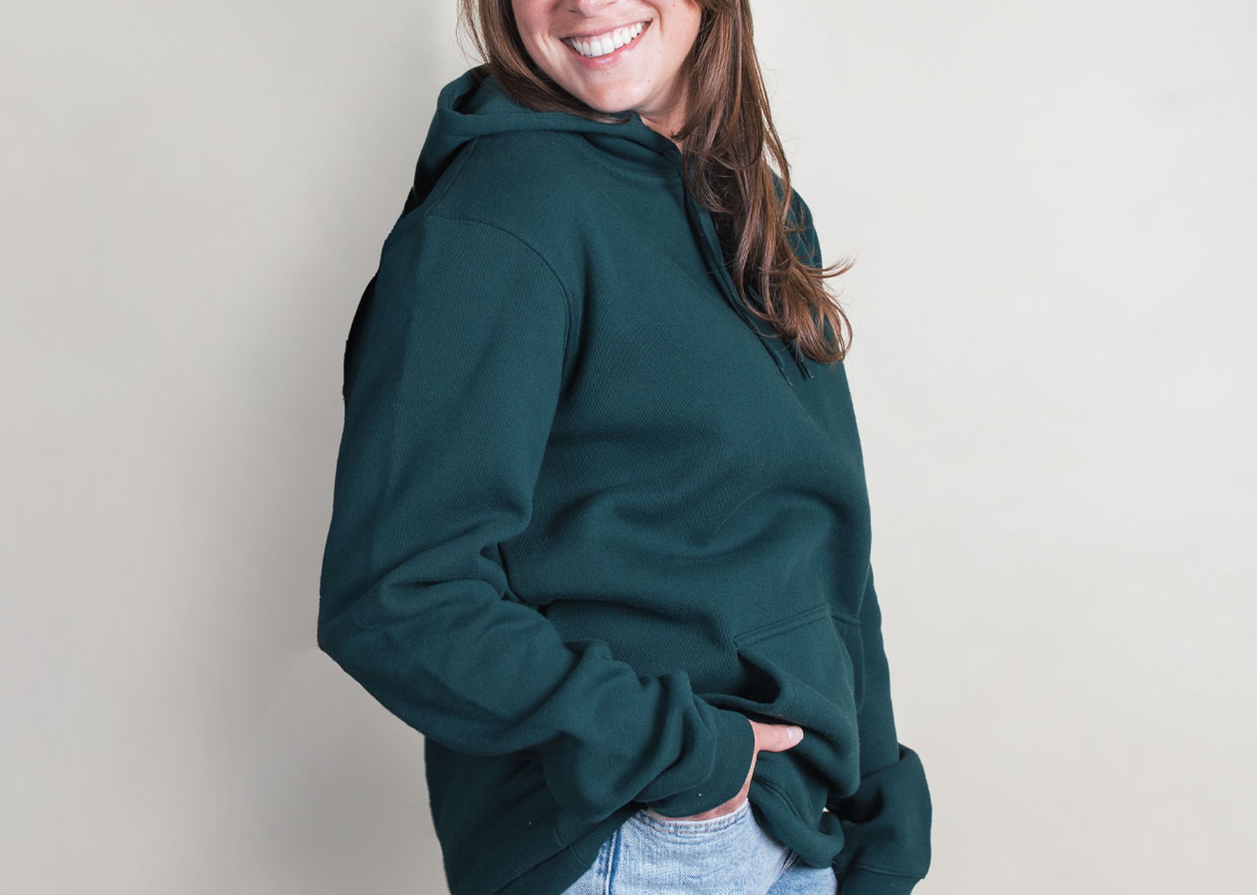 women wearing a green hoodie