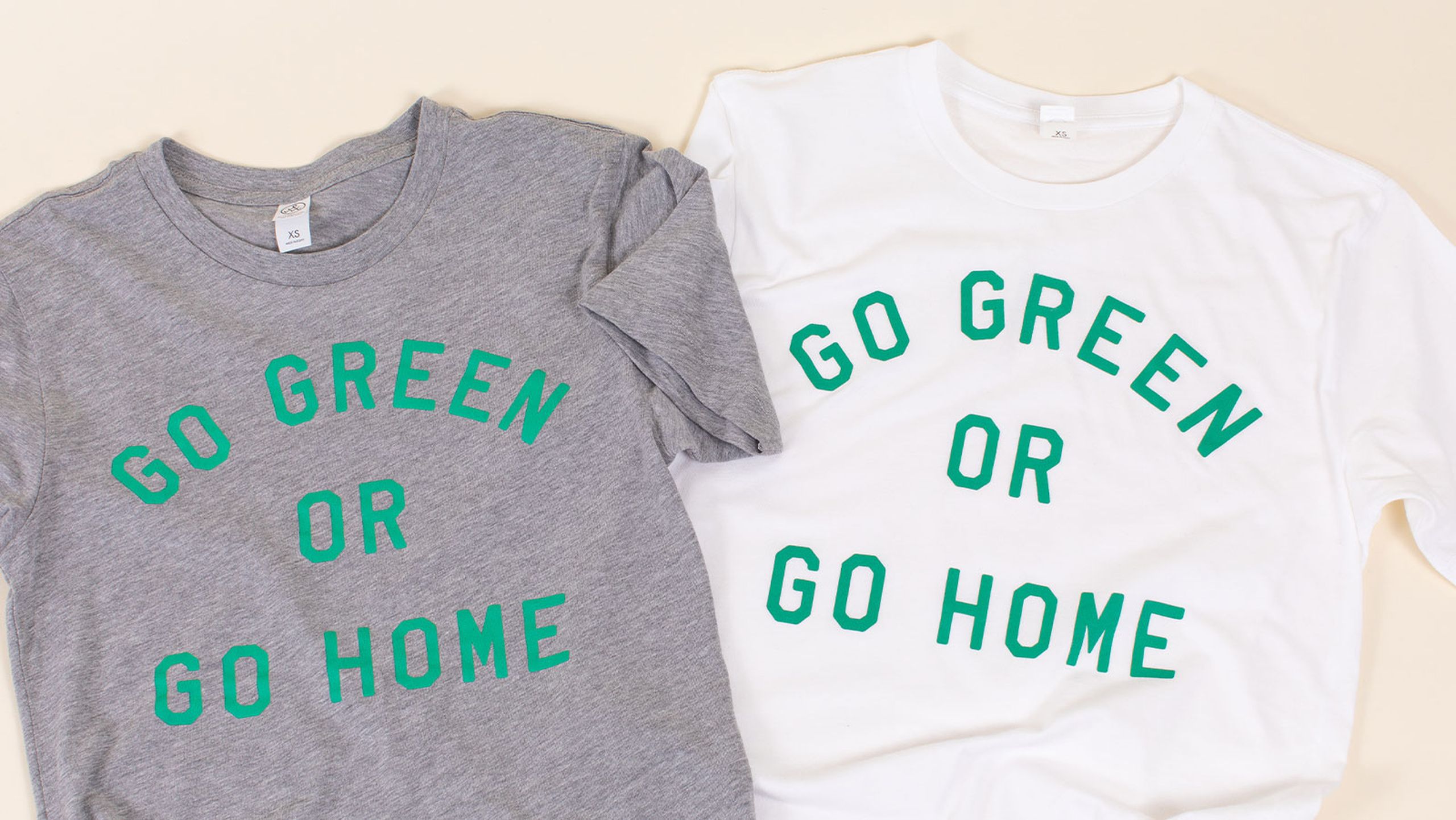 Two t-shirts layout with the text, "go green or go home" printed on them