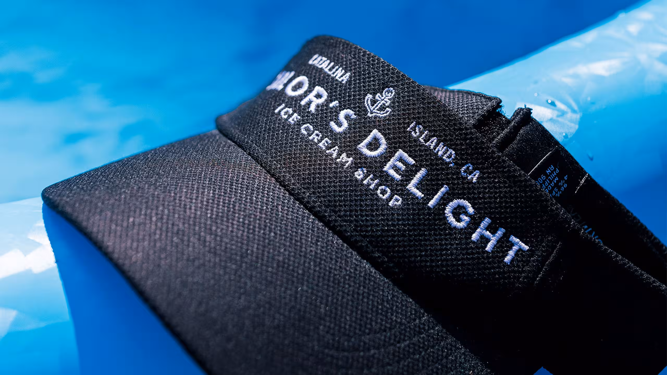 black visor white embroidered lettering