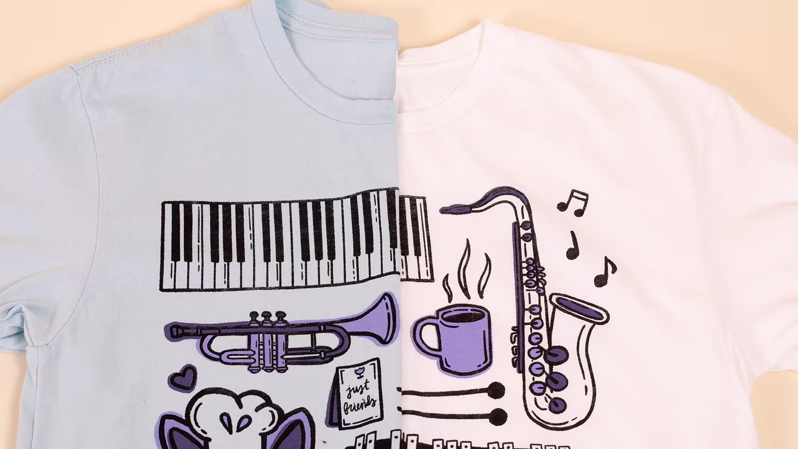 Two t-shirts folded in half, mirror each other.