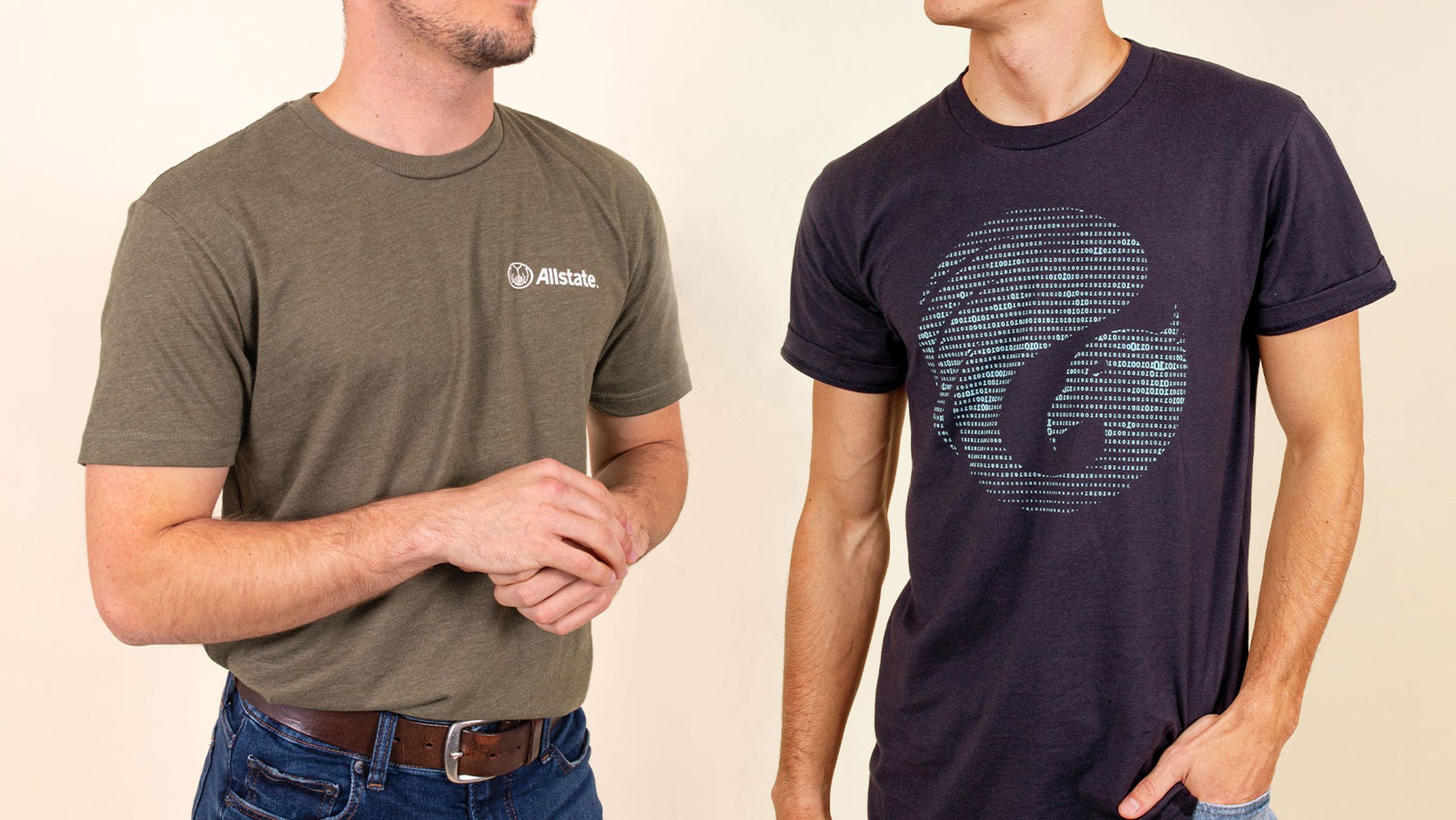 two people wearing t-shirts, one olive green and one navy