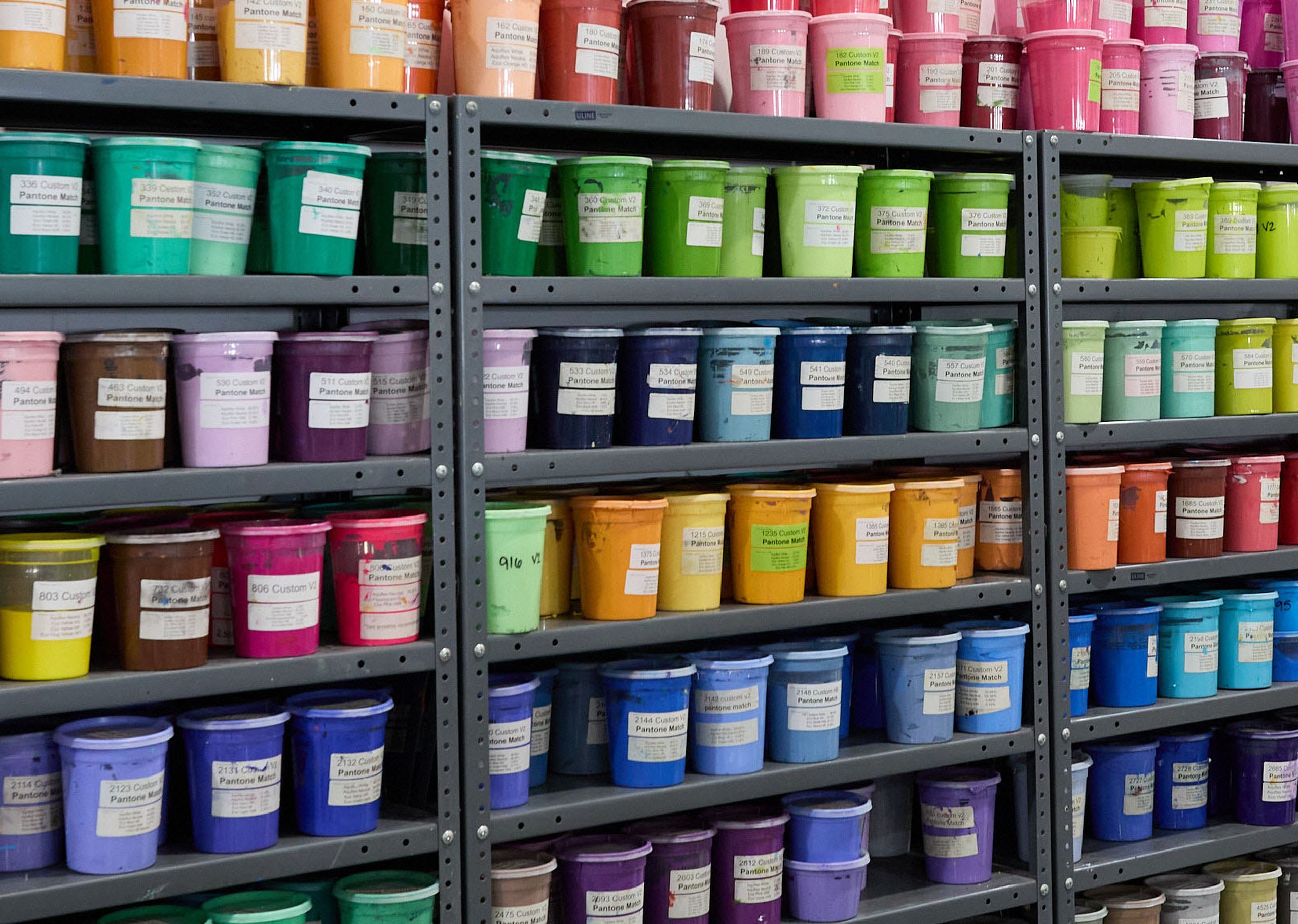 shelves full of different color inks
