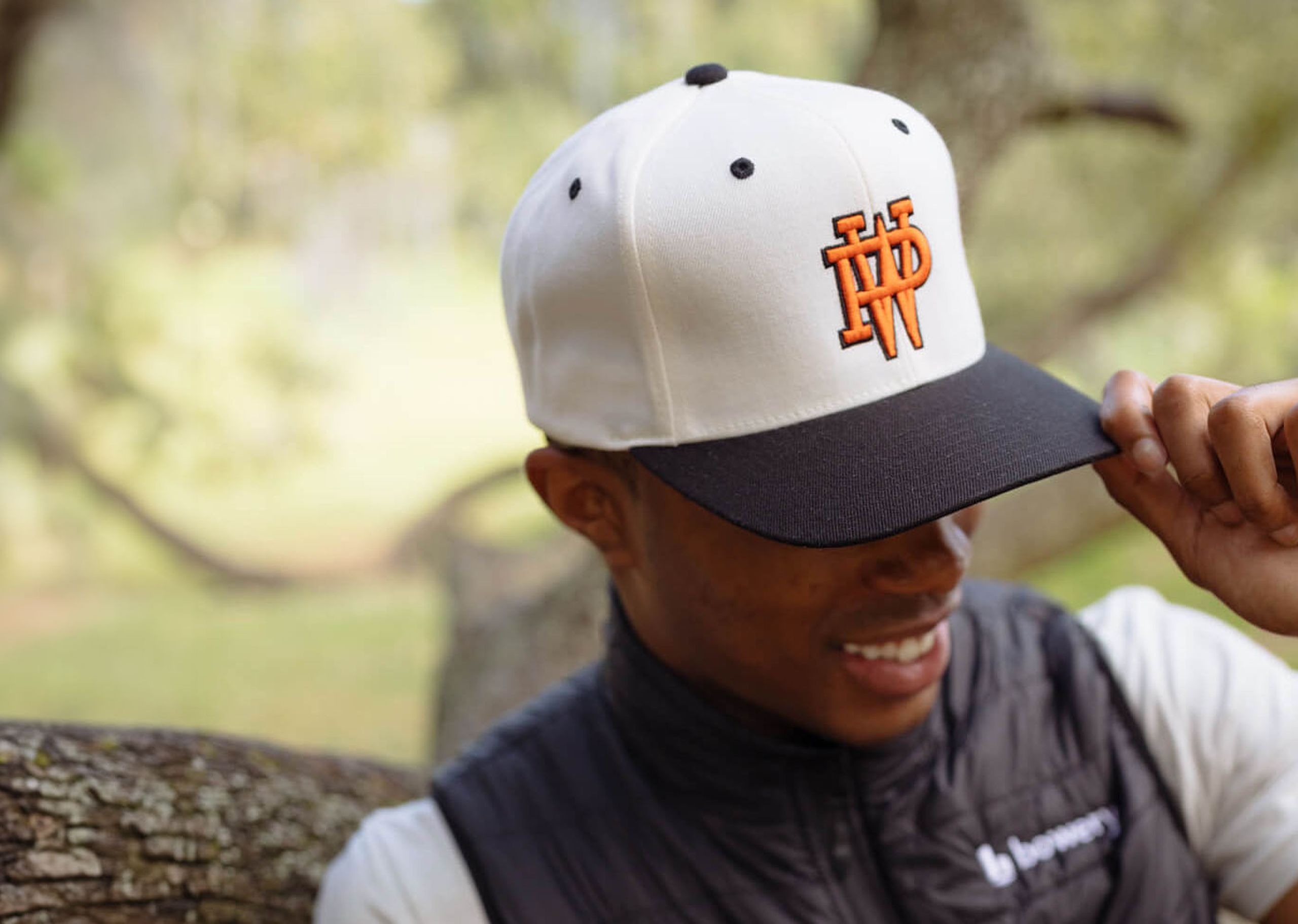 man wearing a embroidered hat