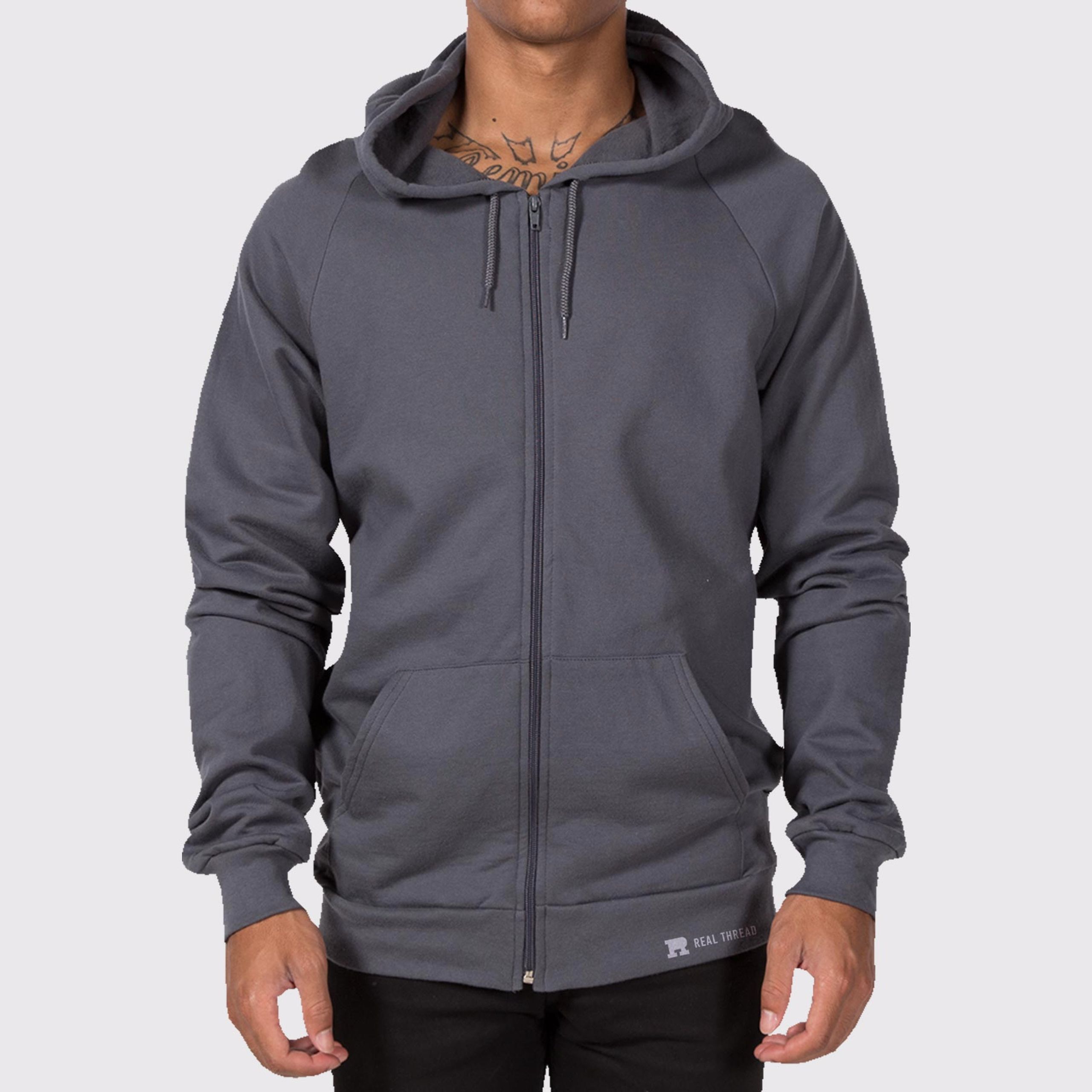 man wearing a dark grey zip-up hoodie