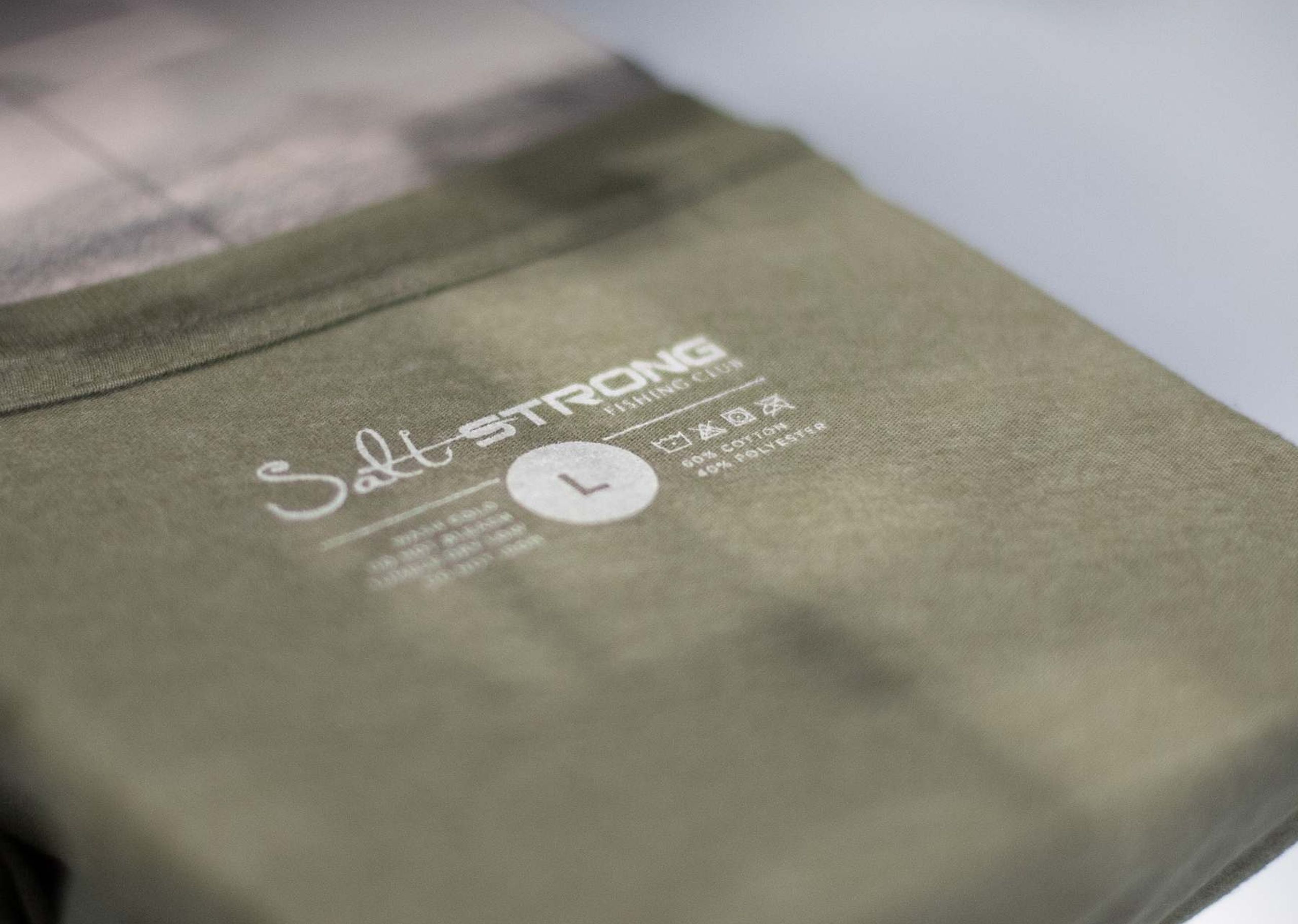 A custom printed tag, just printed and still on the printing press