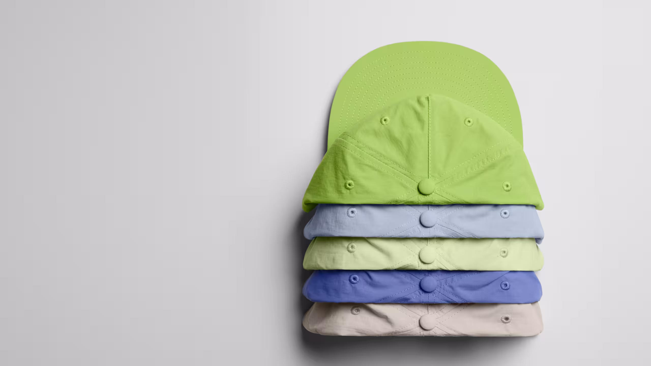 a stack of as colour hats