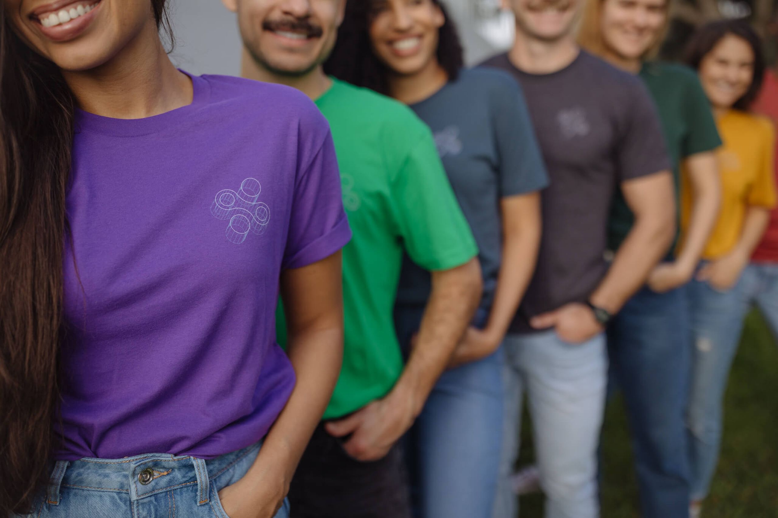 A group of 7 all wear matching custom t-shirts in different shades 