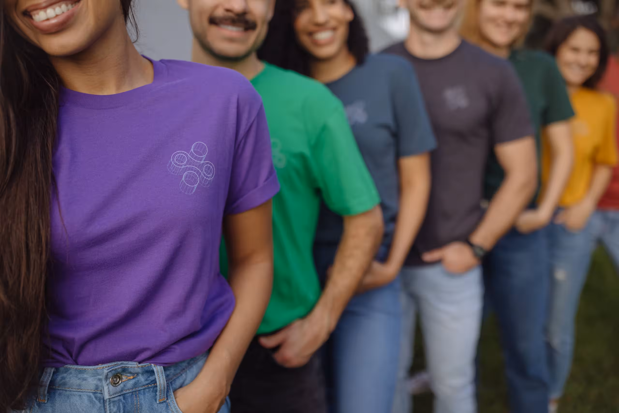 A group of 7 all wear matching custom t-shirts in different shades 