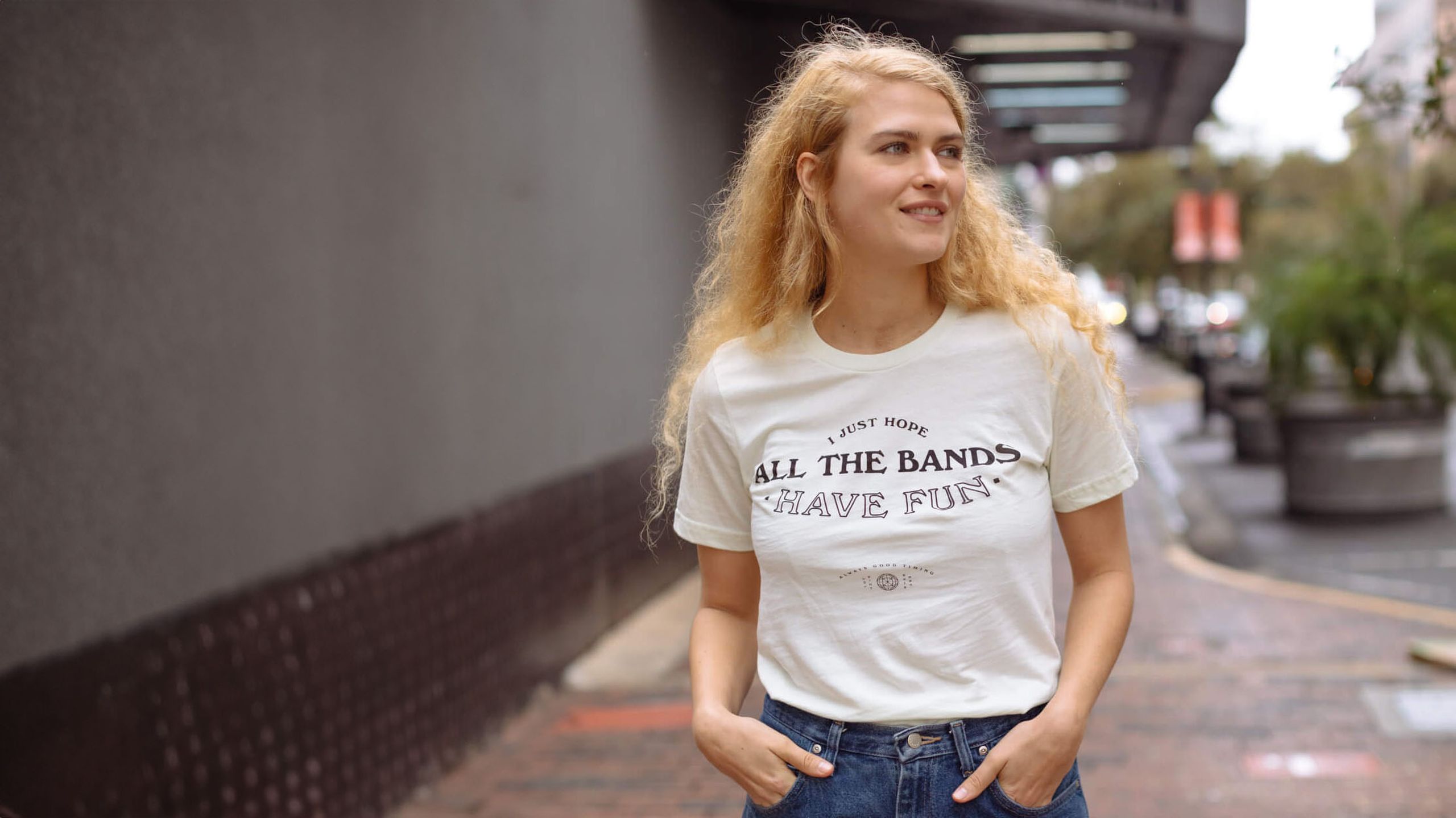 women wearing a white shirt with black text printed on it