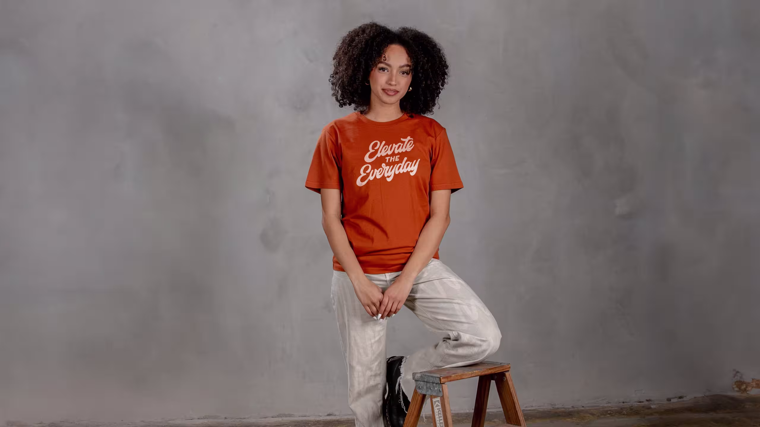 women wearing a orange t-shirt