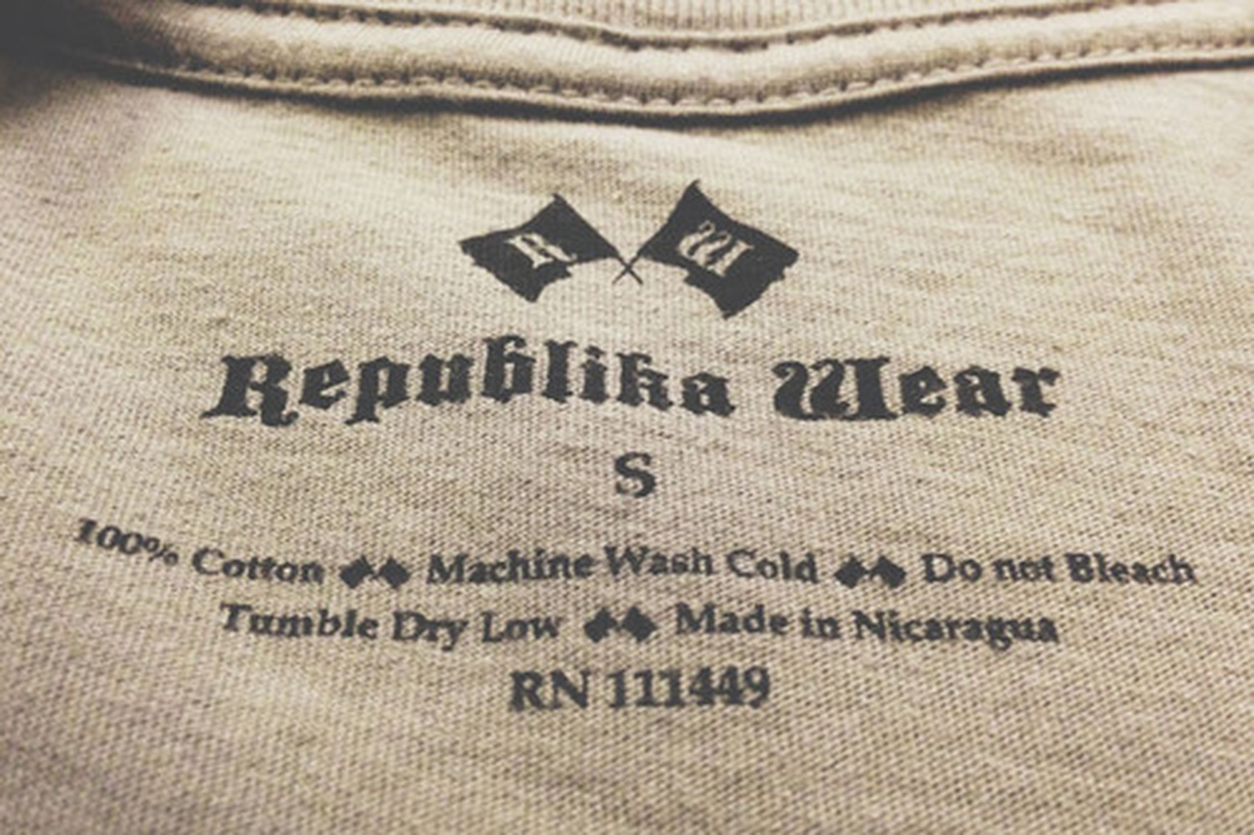 close up of a printed tag on a t-shirt