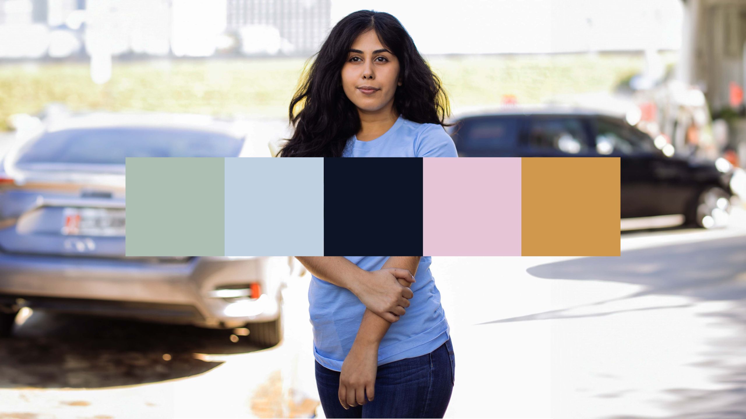 women wearing a blue shirt with the five different color blocks overtop