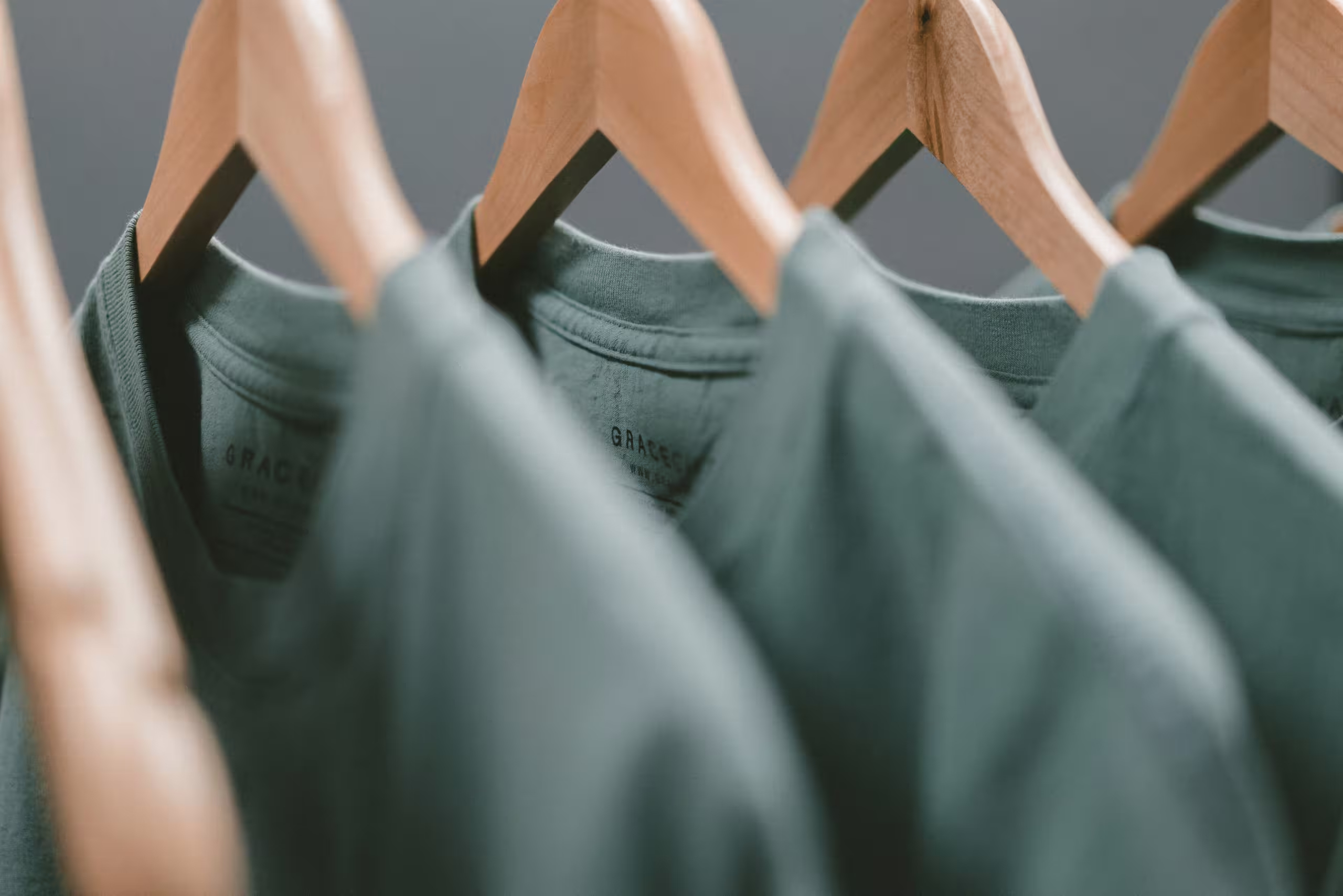 Green Shirts on Clothing Rack