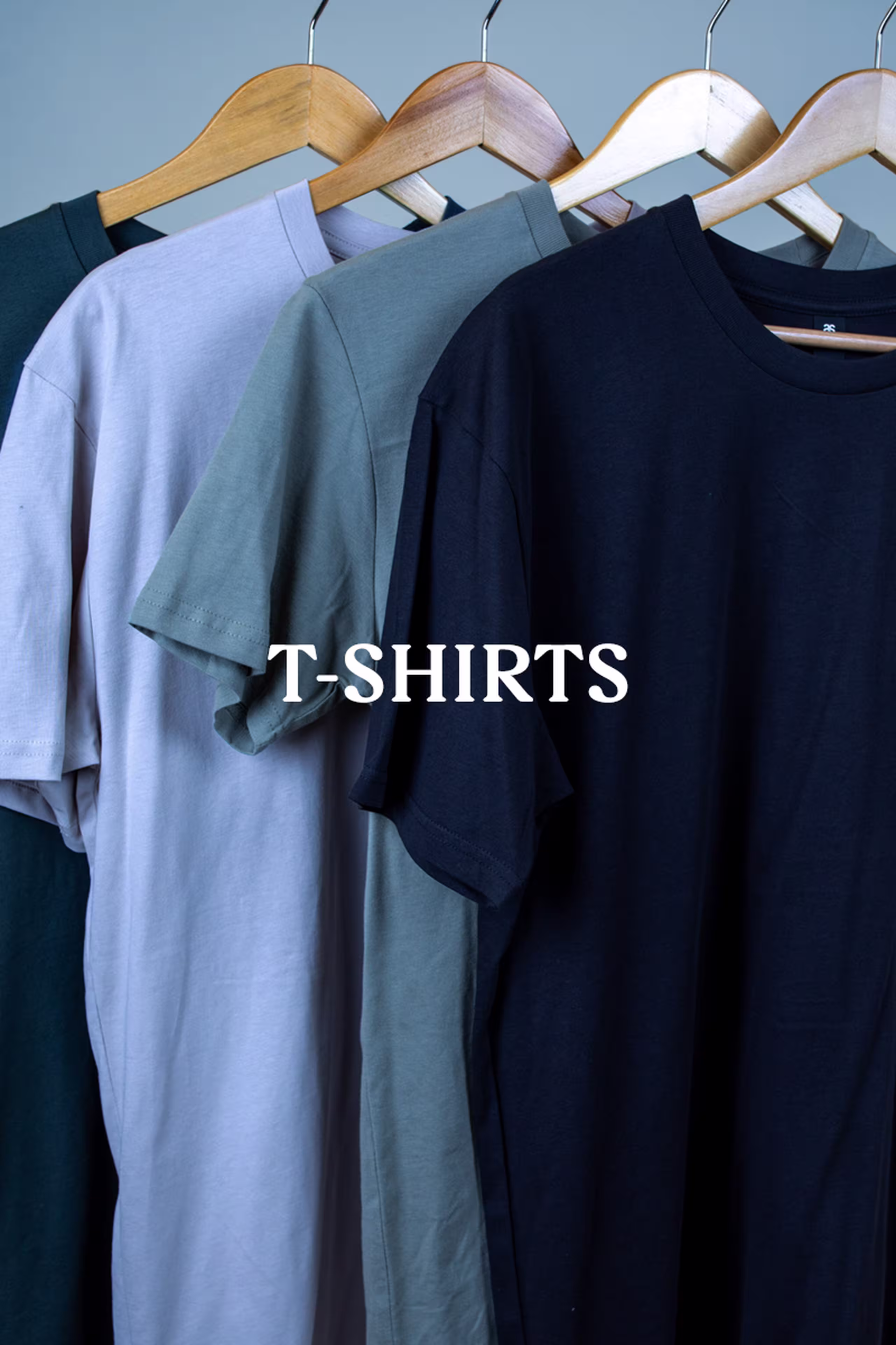 t-shirts, blue t-shirts hanging with the word t-shirt