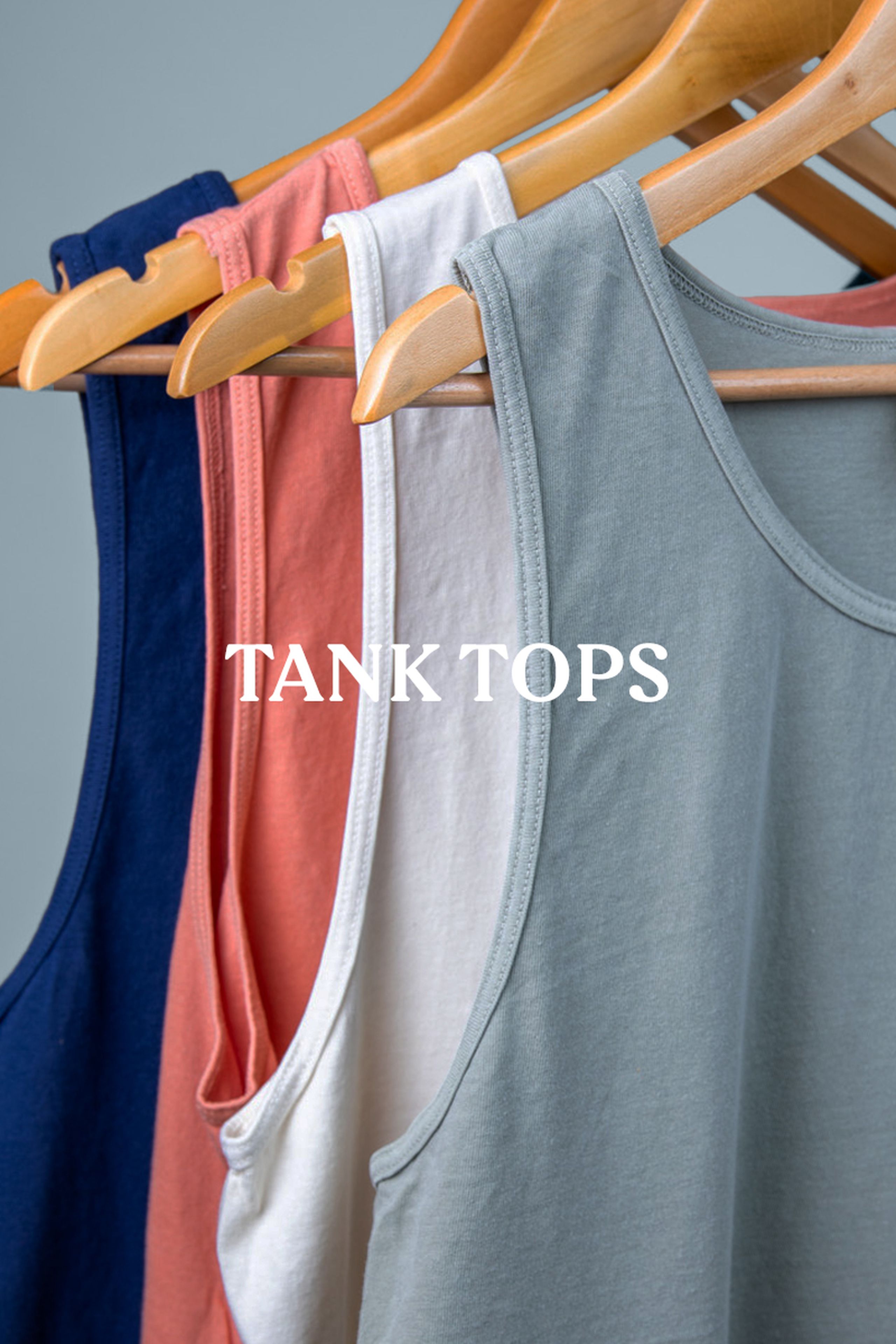 tank tops, collection of tank tops hanging on hangers