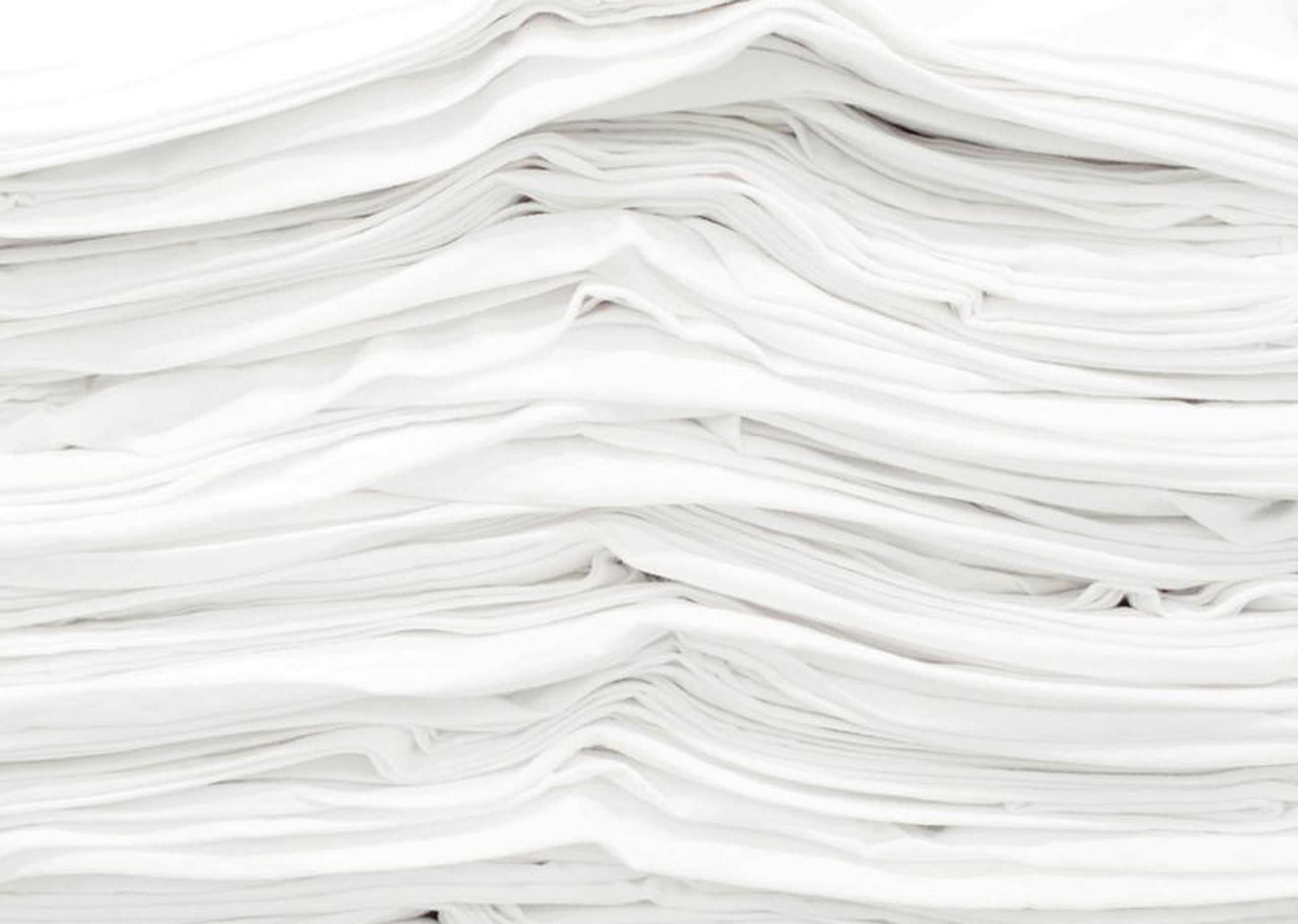 stack of white t-shirts
