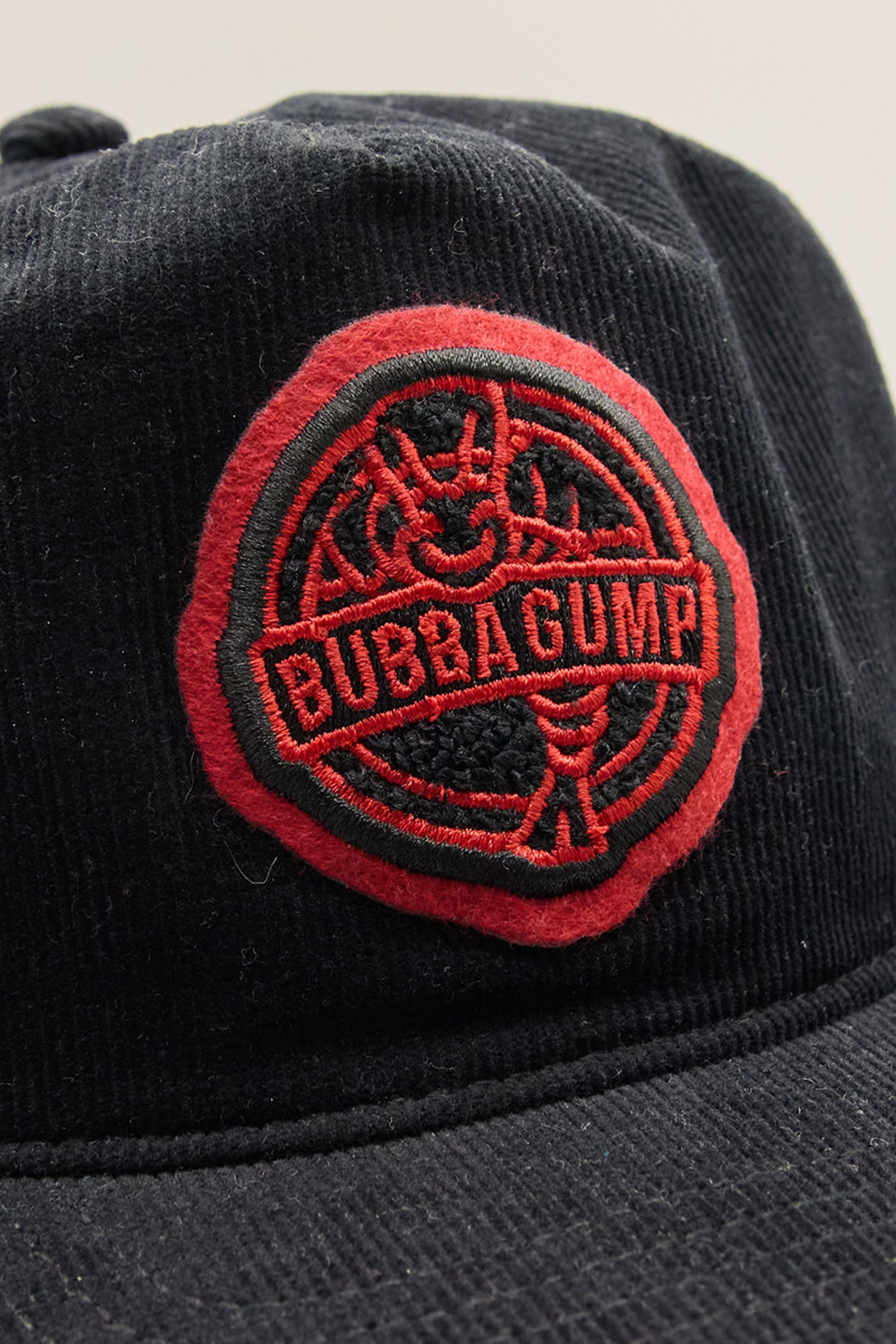 a red and black Bubba Gump Chenille patch