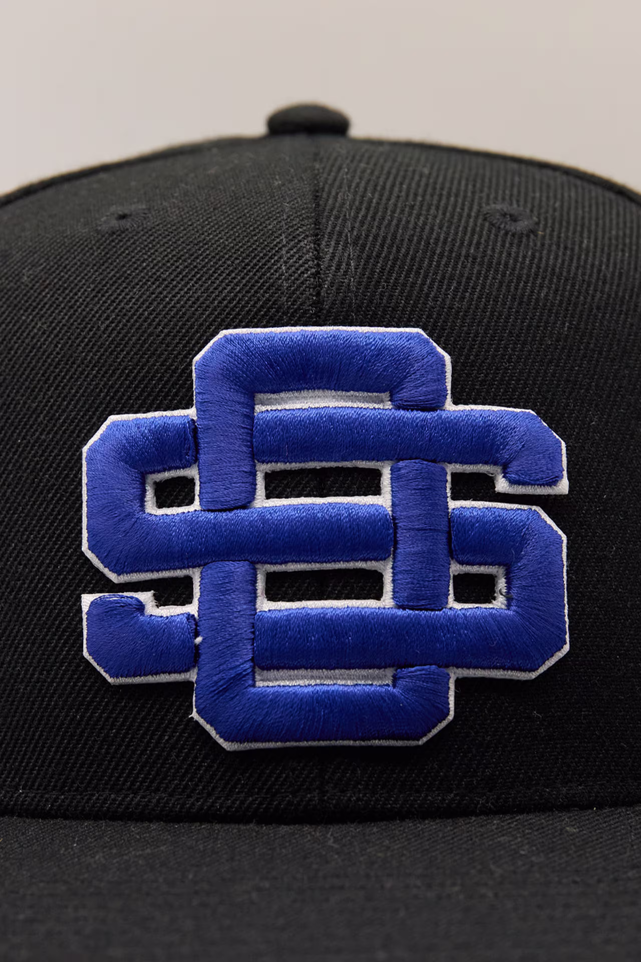 a blue and white s and c monogram 3d embroidered patch