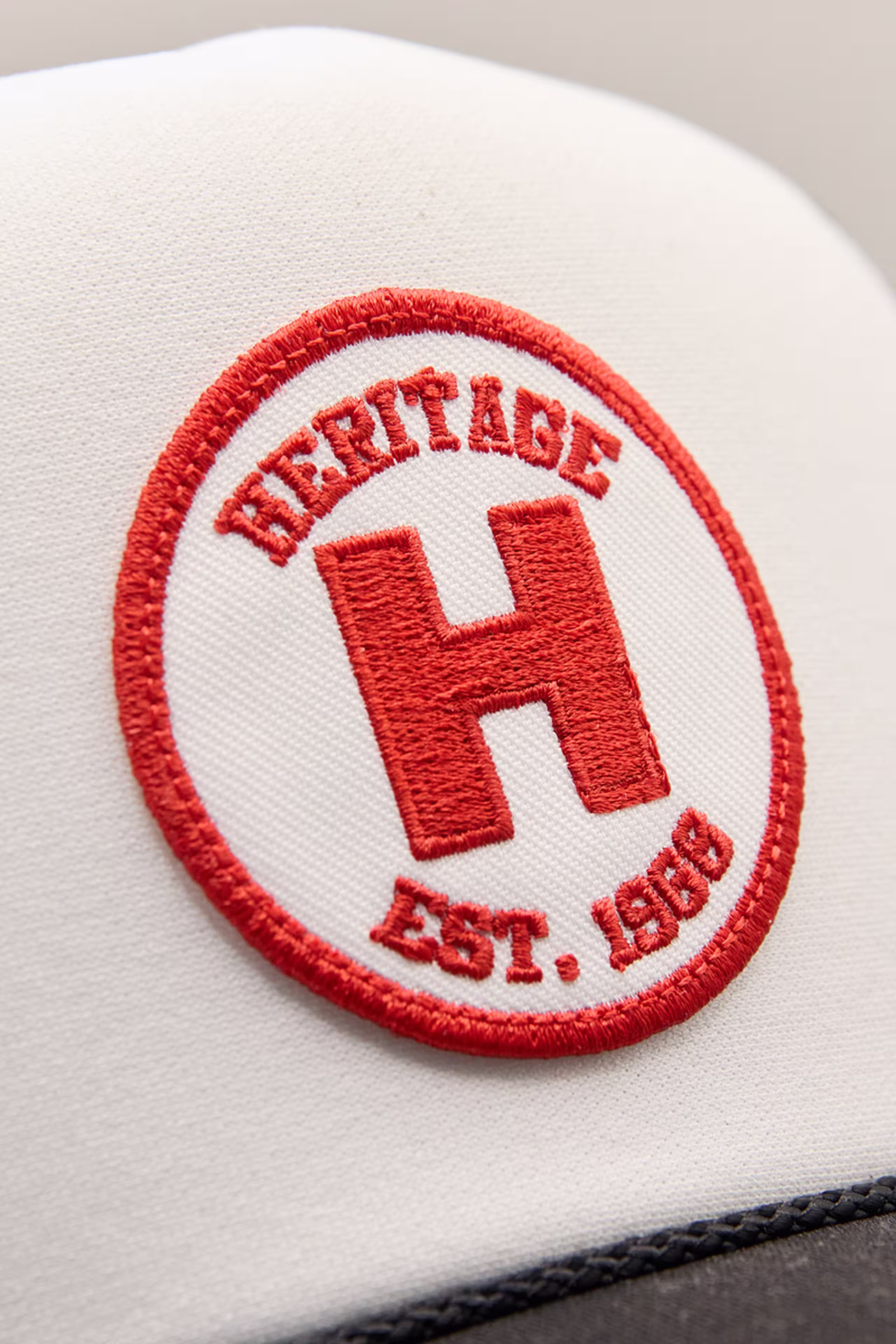 red and white circle embroidery patch