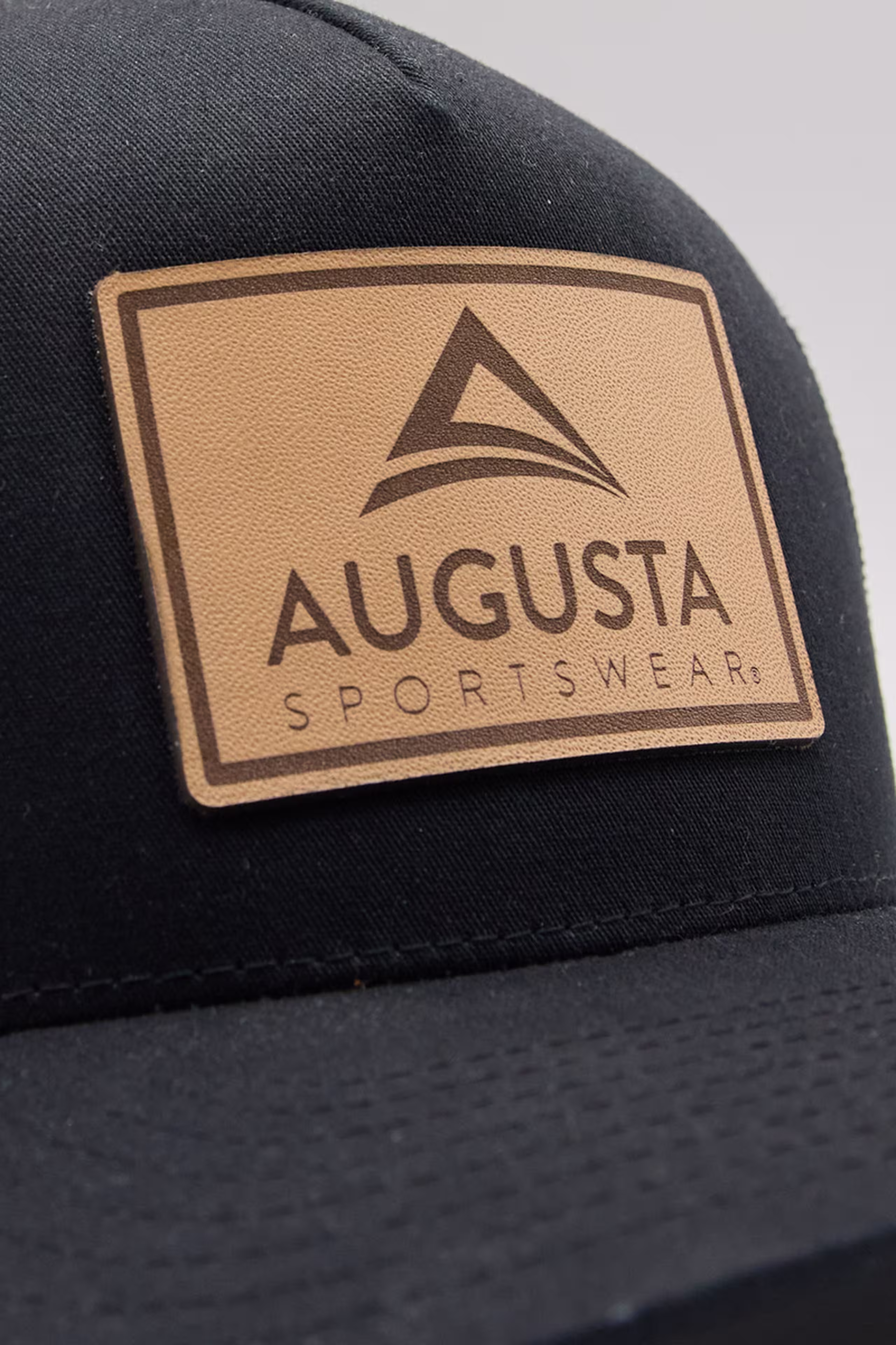 rectangle leather patch on a black hat