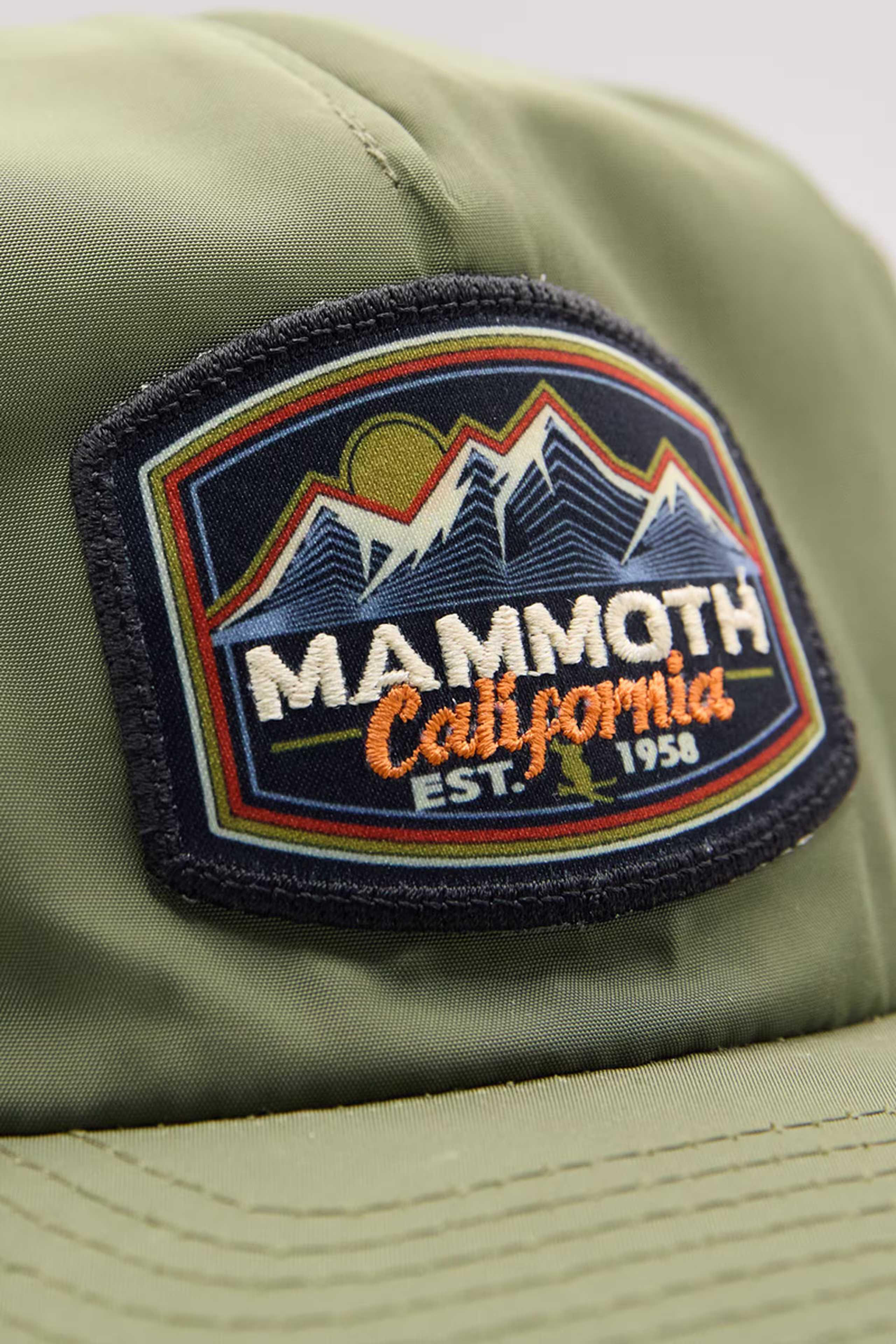 print stitch patch with mountain illustration and the words mammoth California