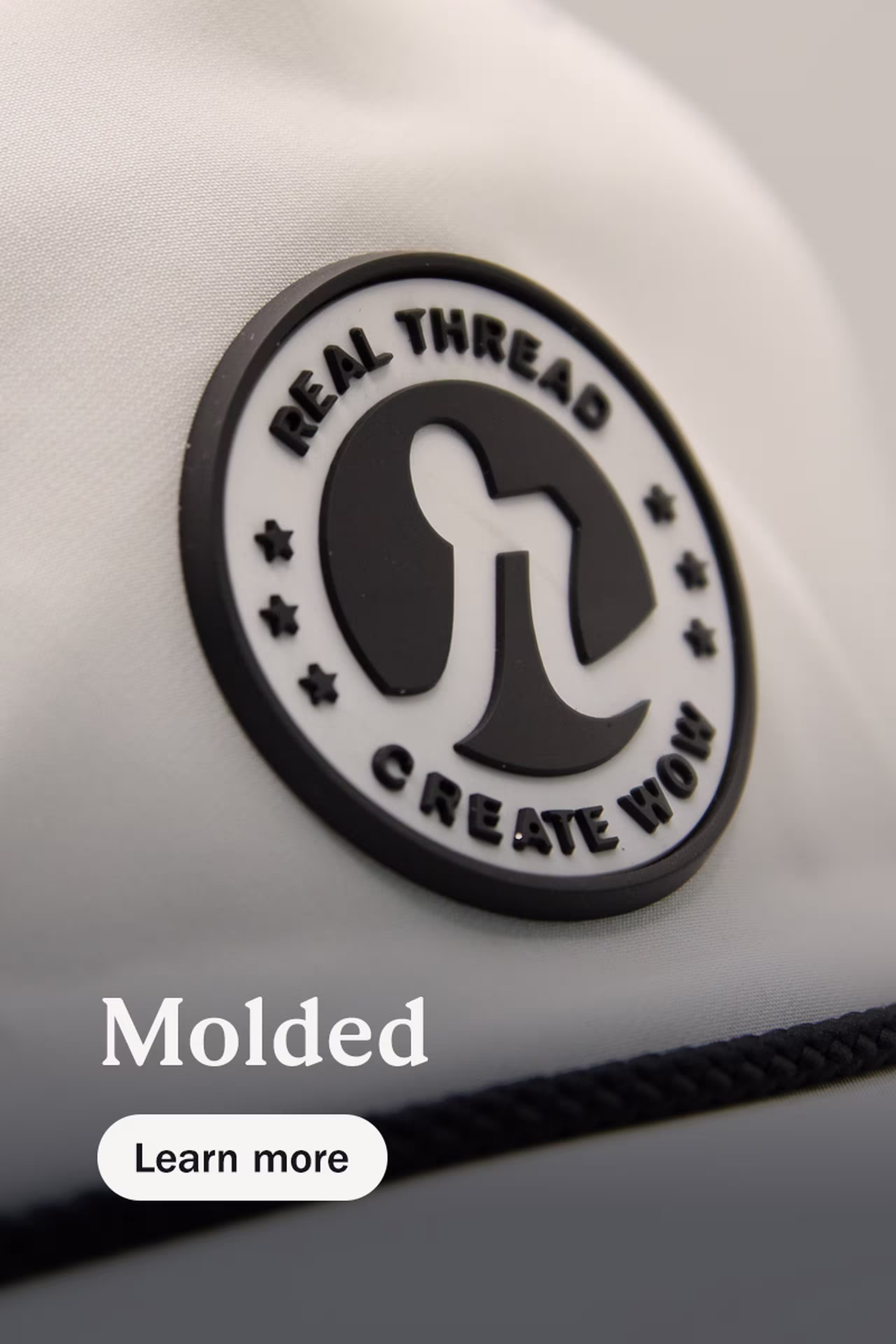 Molded - Learn more - white hat with a black cord and molded real thread logo patch