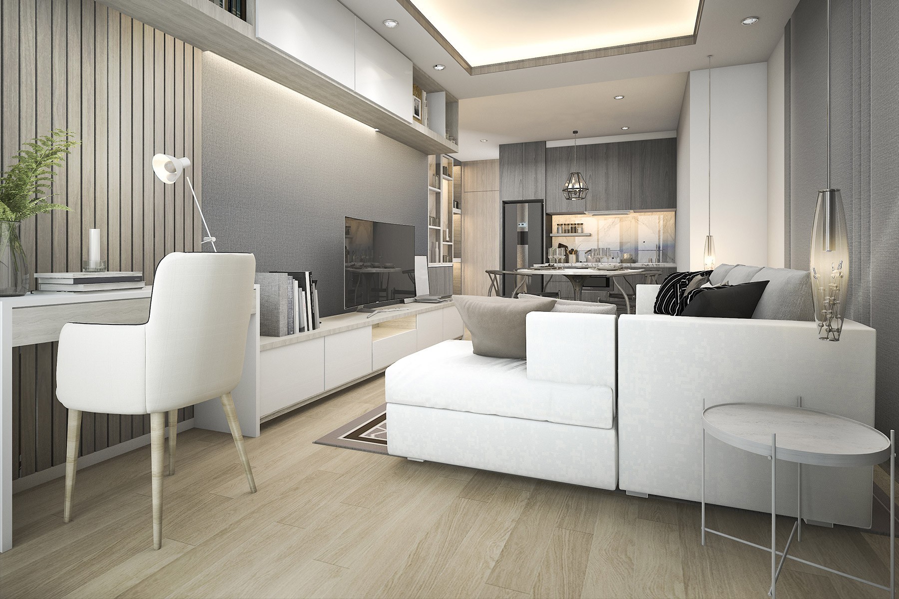 Modern living room with white furniture, wooden floors, and a kitchen area in the background.