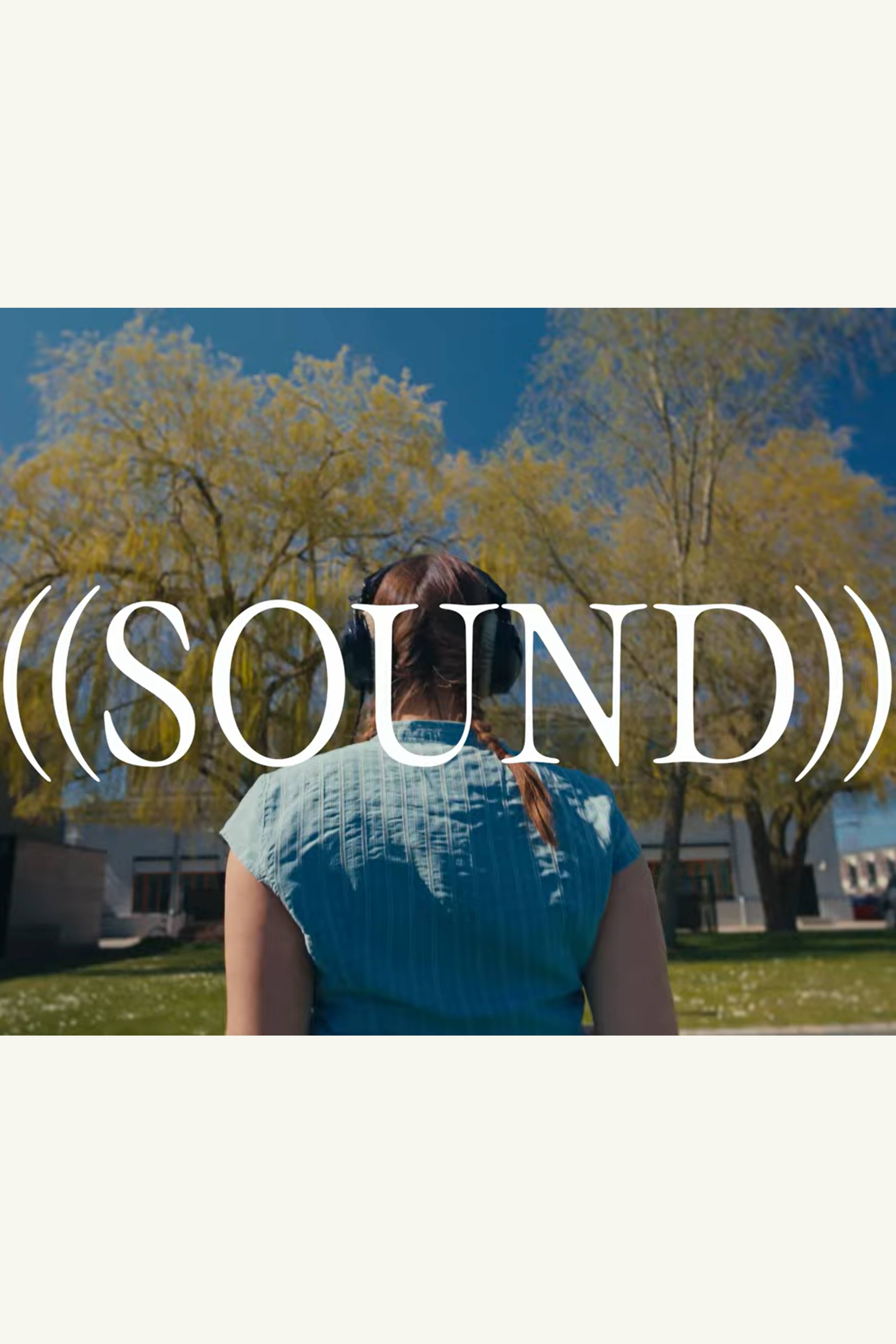 Person with headphones under trees, viewed from behind, with the word "SOUND" overlayed in large white text.