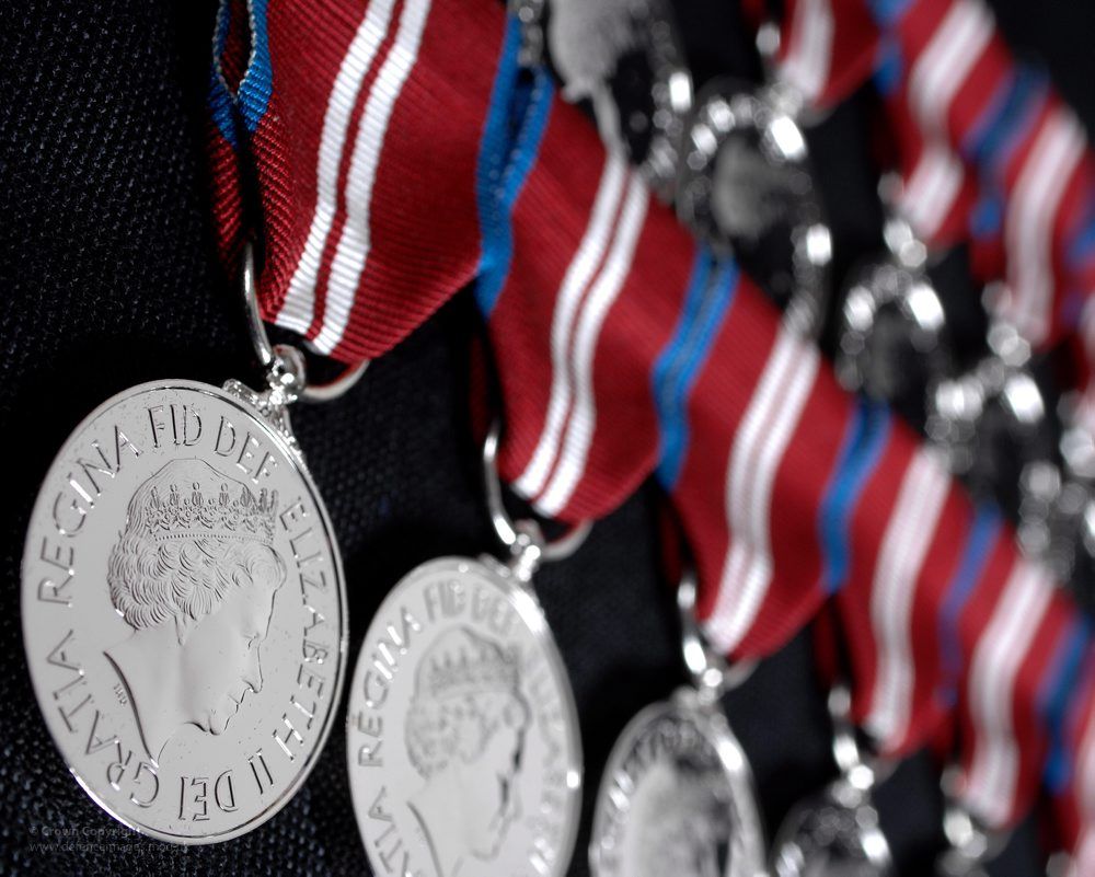 obe meaning is associated with medals