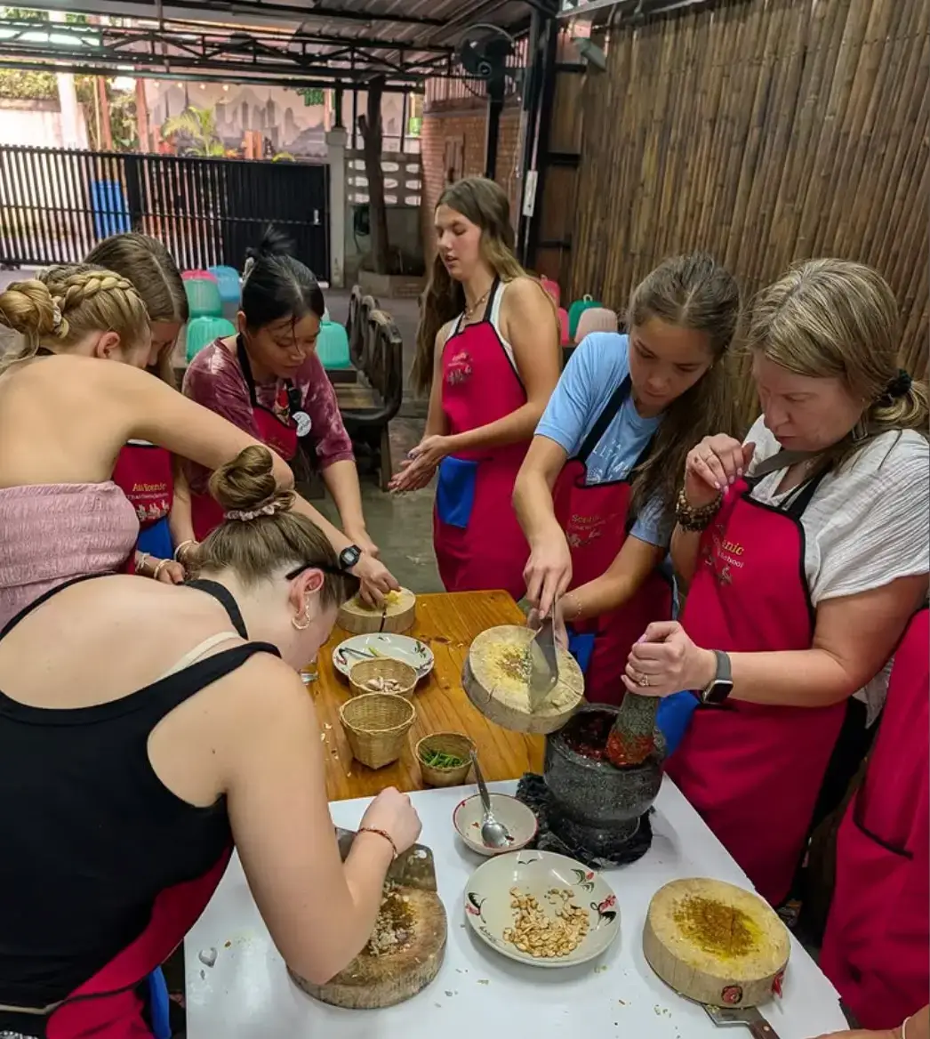 Travelers cooking in Thailand